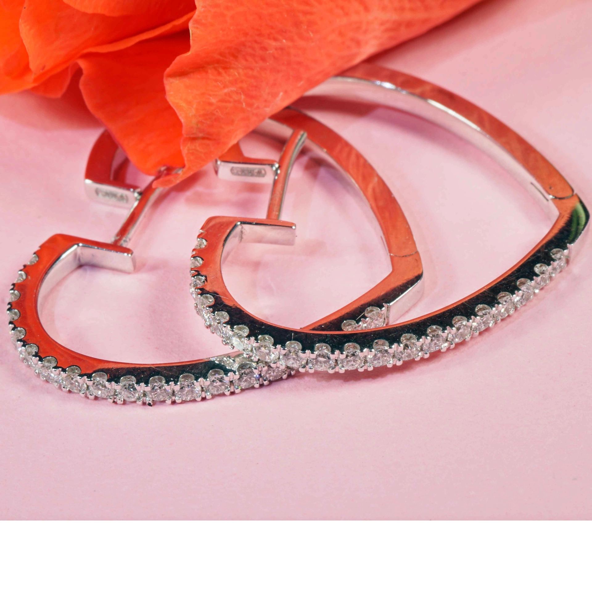 Heartshaped Brilliant Creoles....italian Life Energy for every Day...18 kt Heart Gold