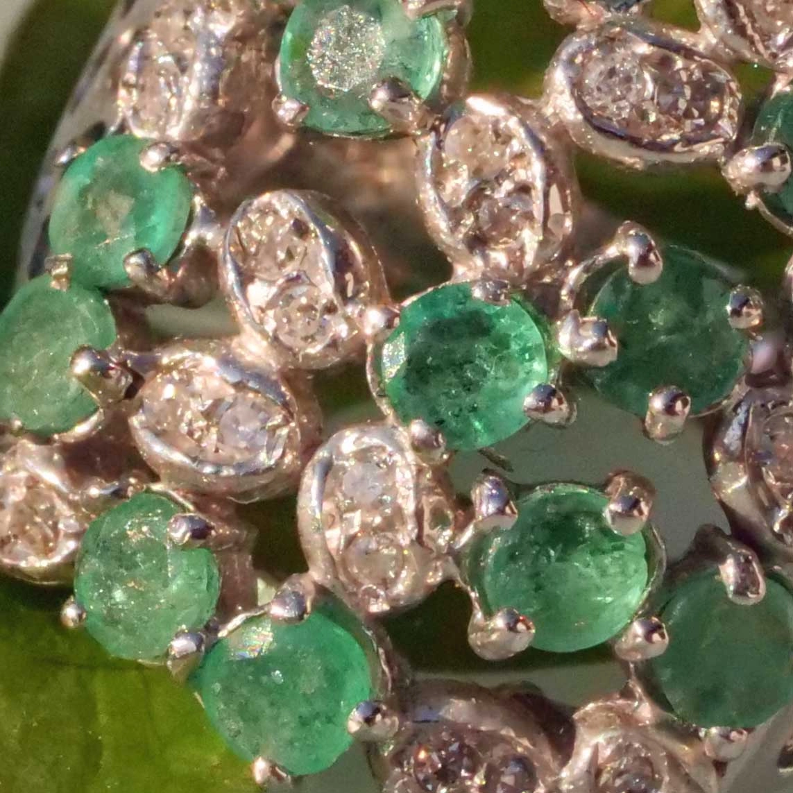 Representative Emerald Diamond Ring of a special kind 18 kt White Gold