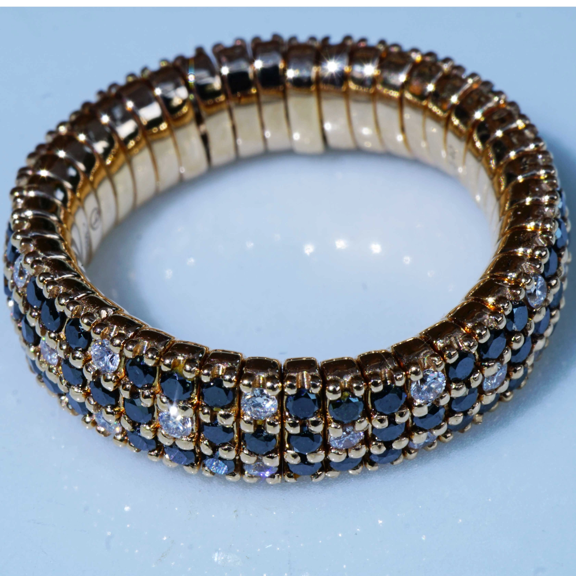 Brilliant Memory Ring Magic flexibel black-white 18 kt Rosegold..ingenious and simple
