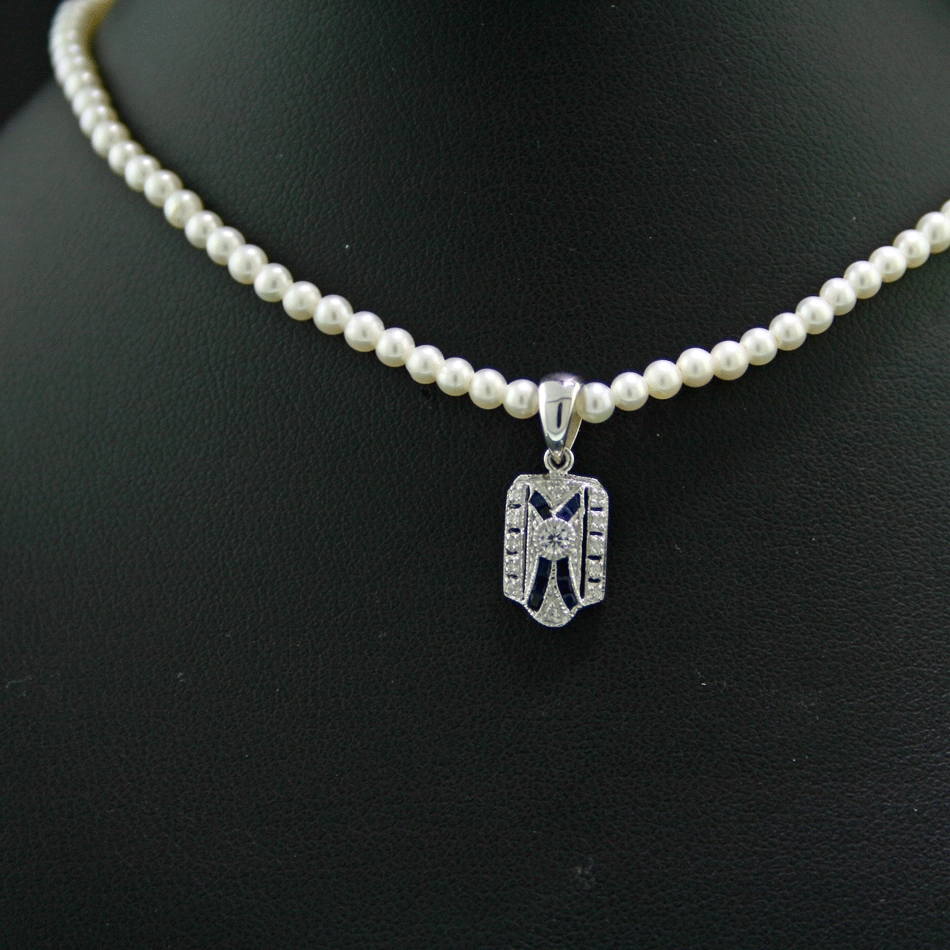 Anhänger mit feinster Akoya-Kette, 375/-WG.