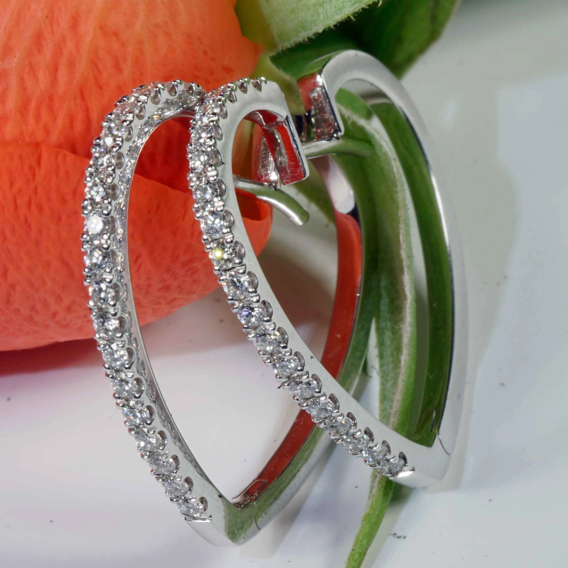 Heartshaped Brilliant Creoles....italian Life Energy for every Day...18 kt Heart Gold