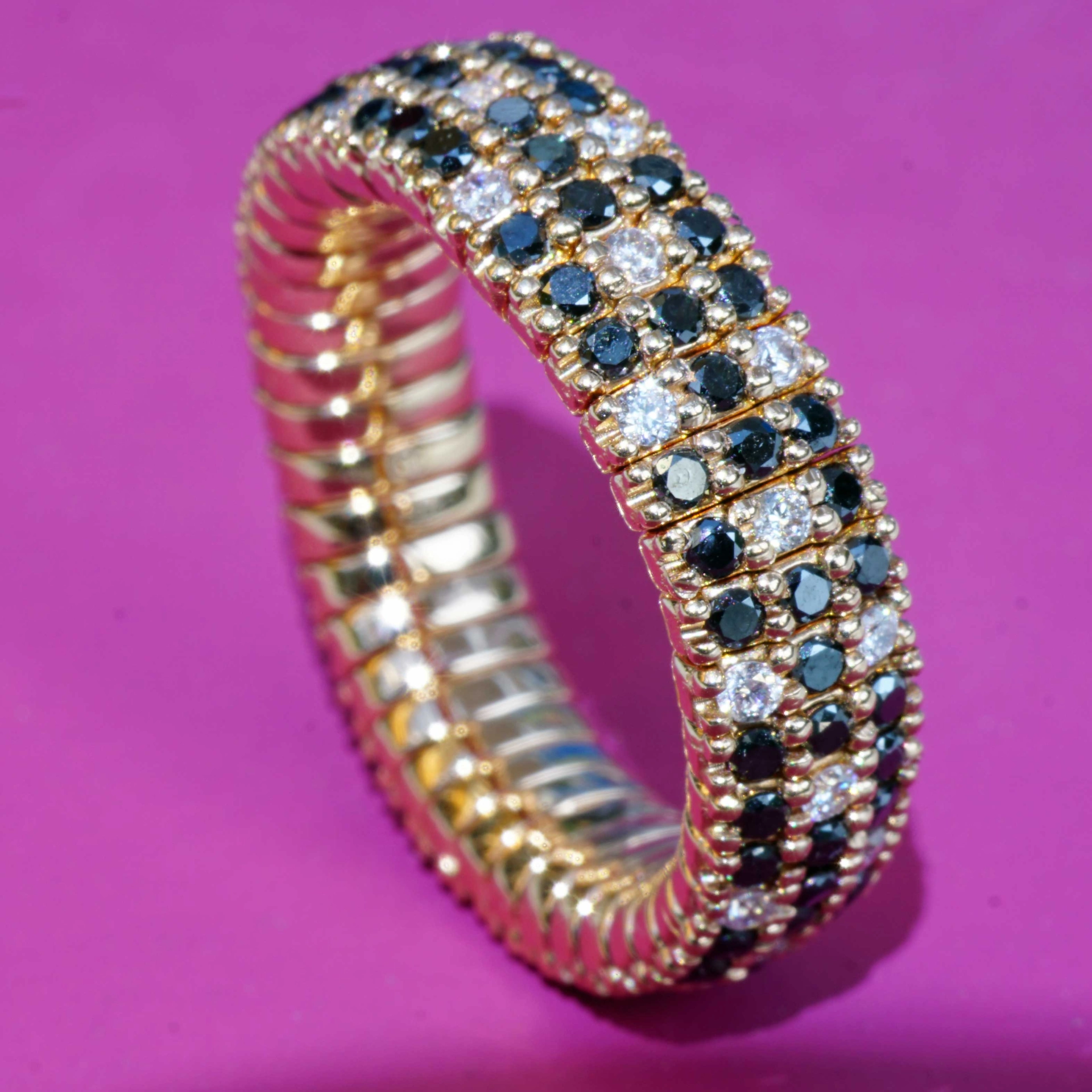 Brilliant Memory Ring Magic flexibel black-white 18 kt Rosegold..ingenious and simple