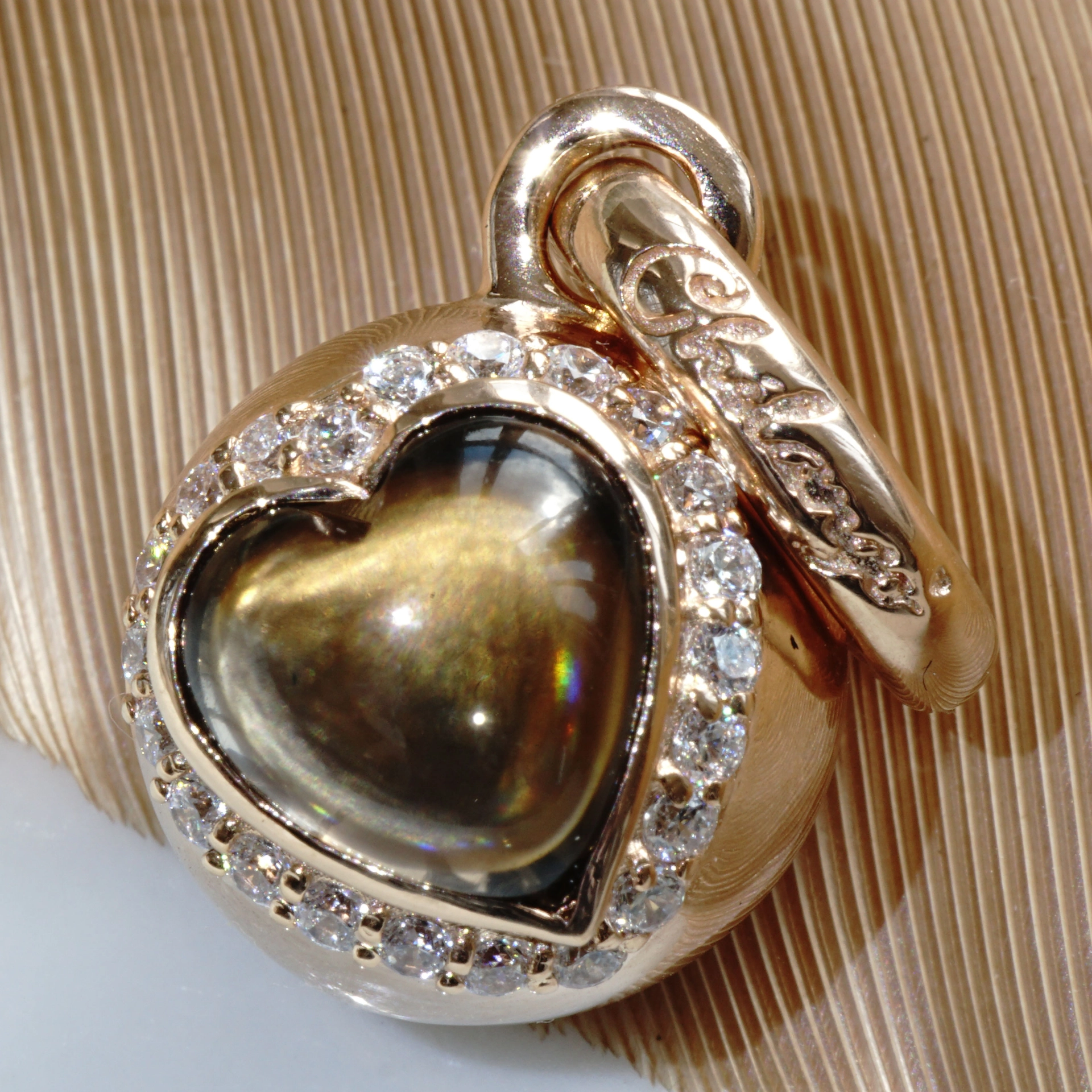 The best Silver Jewelery forever....Heartball with Smokey Quartz