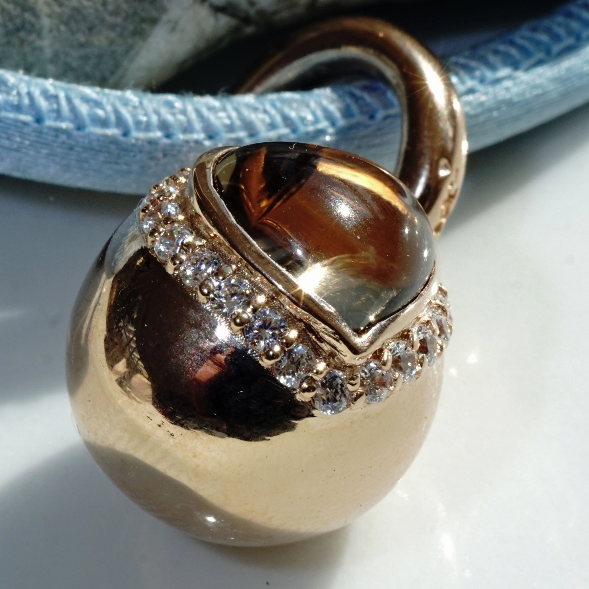 The best Silver Jewelery forever....Heartball with Smokey Quartz