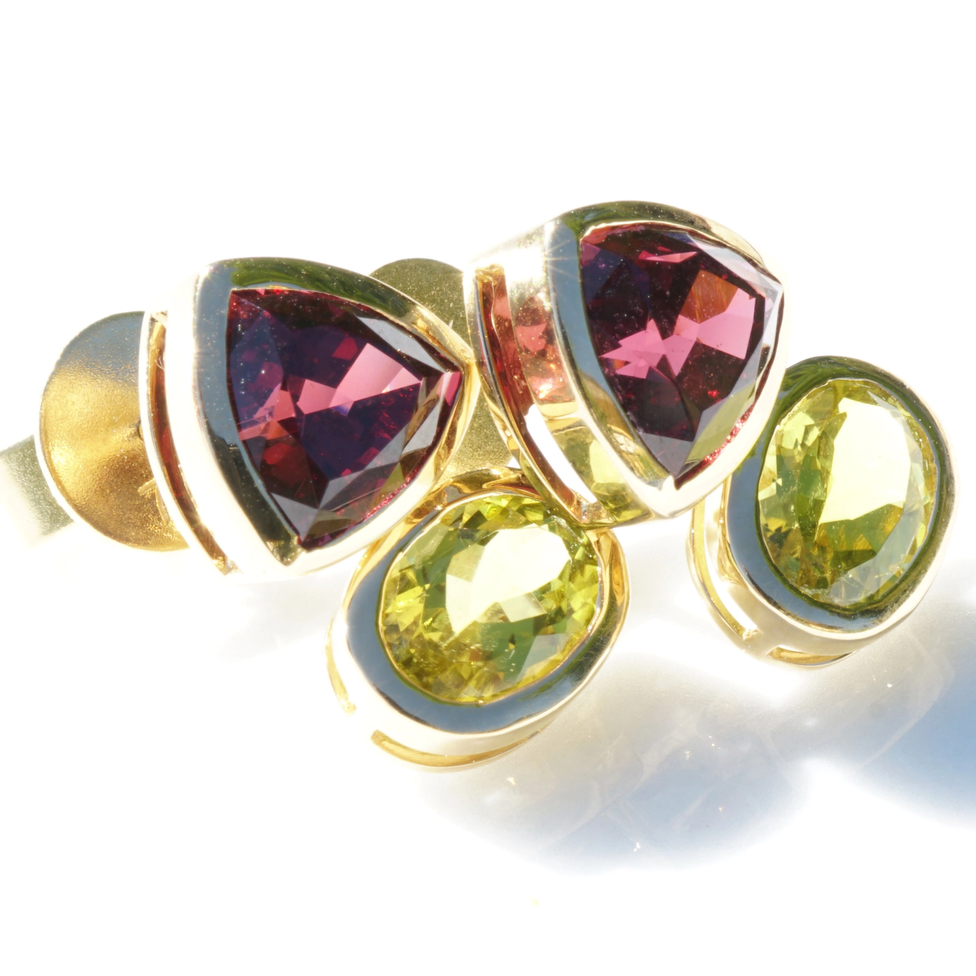 Exotic colors....Rhodolithe from Malawi and Canary Turmalin from Zambia...neon yellow and purple red
