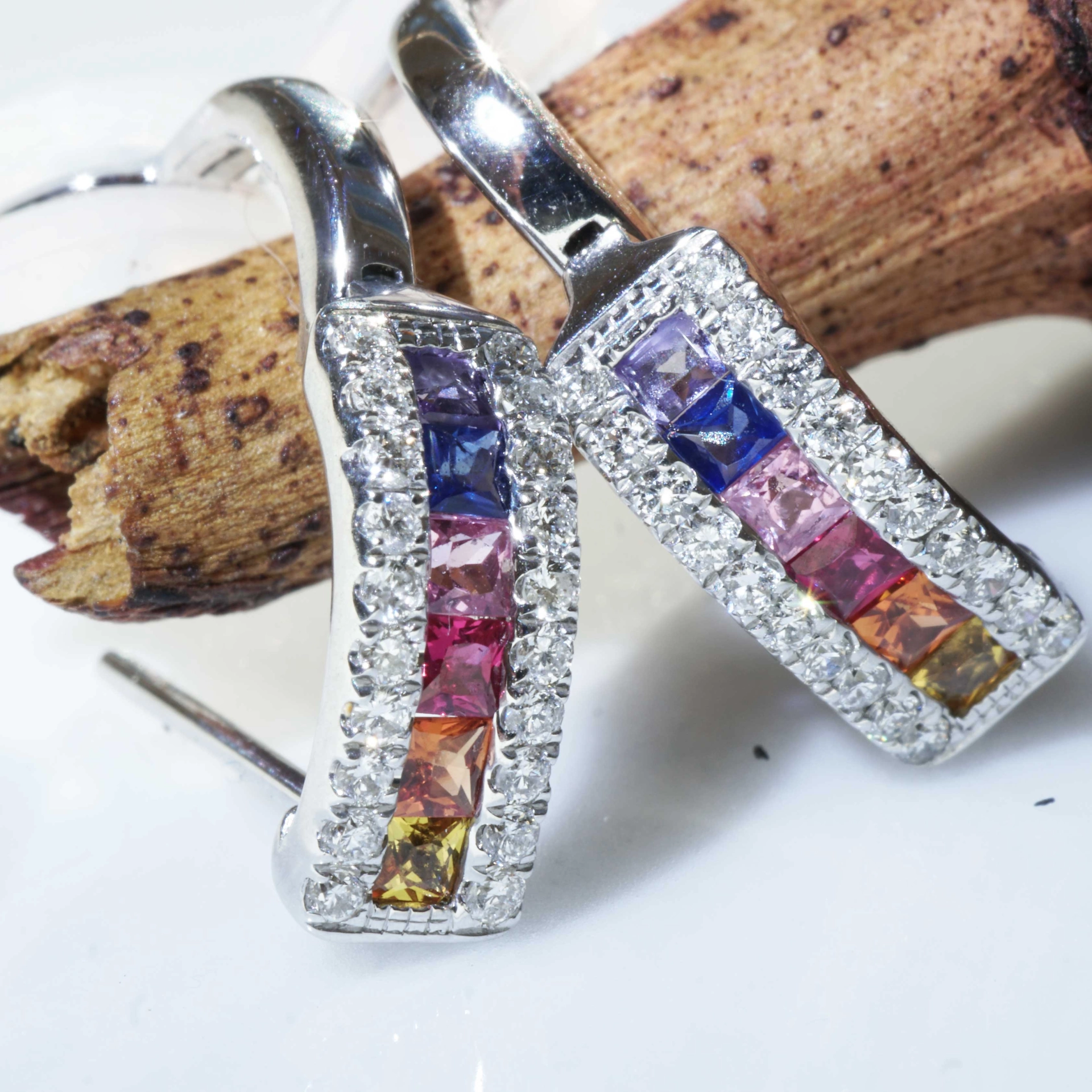 Half Creoles with Bar of colored Saphires, Rubies, Amethyst and Brilliants 18 kt White Gold