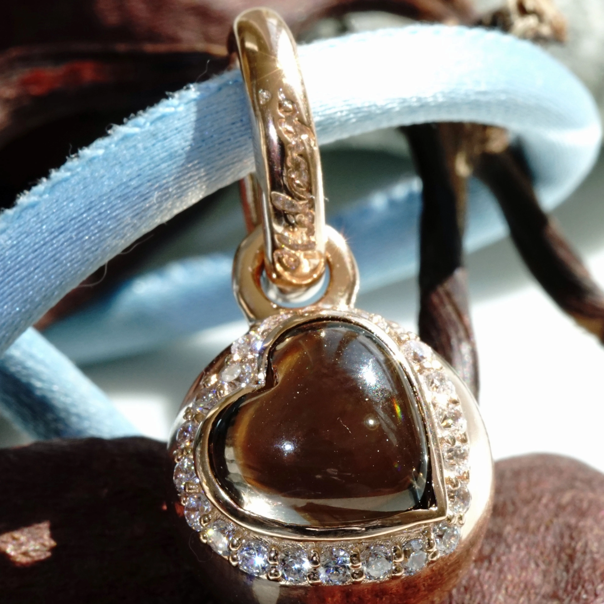 The best Silver Jewelery forever....Heartball with Smokey Quartz
