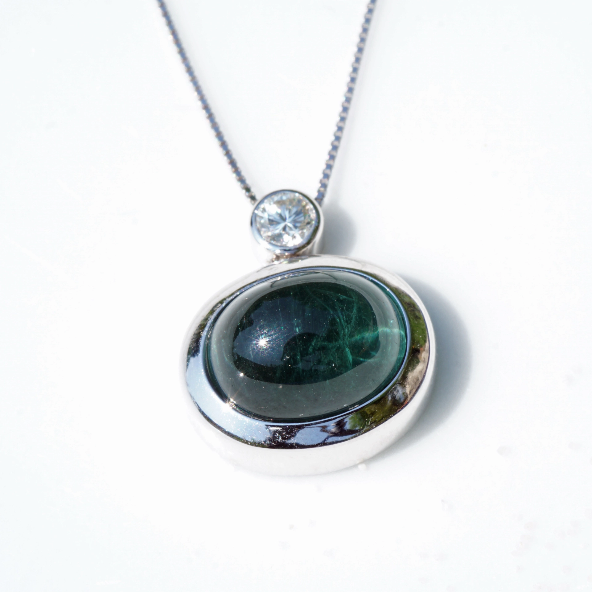 ..big blue turmalin pendant.....very nice color....great appearance, cabochon, approx. 8.35 ct, AAA loupeclean diamond