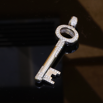 Key Pendant 18 kt solid Whitegold with Brilliants total 1 ct TW IF-VVS....so precious