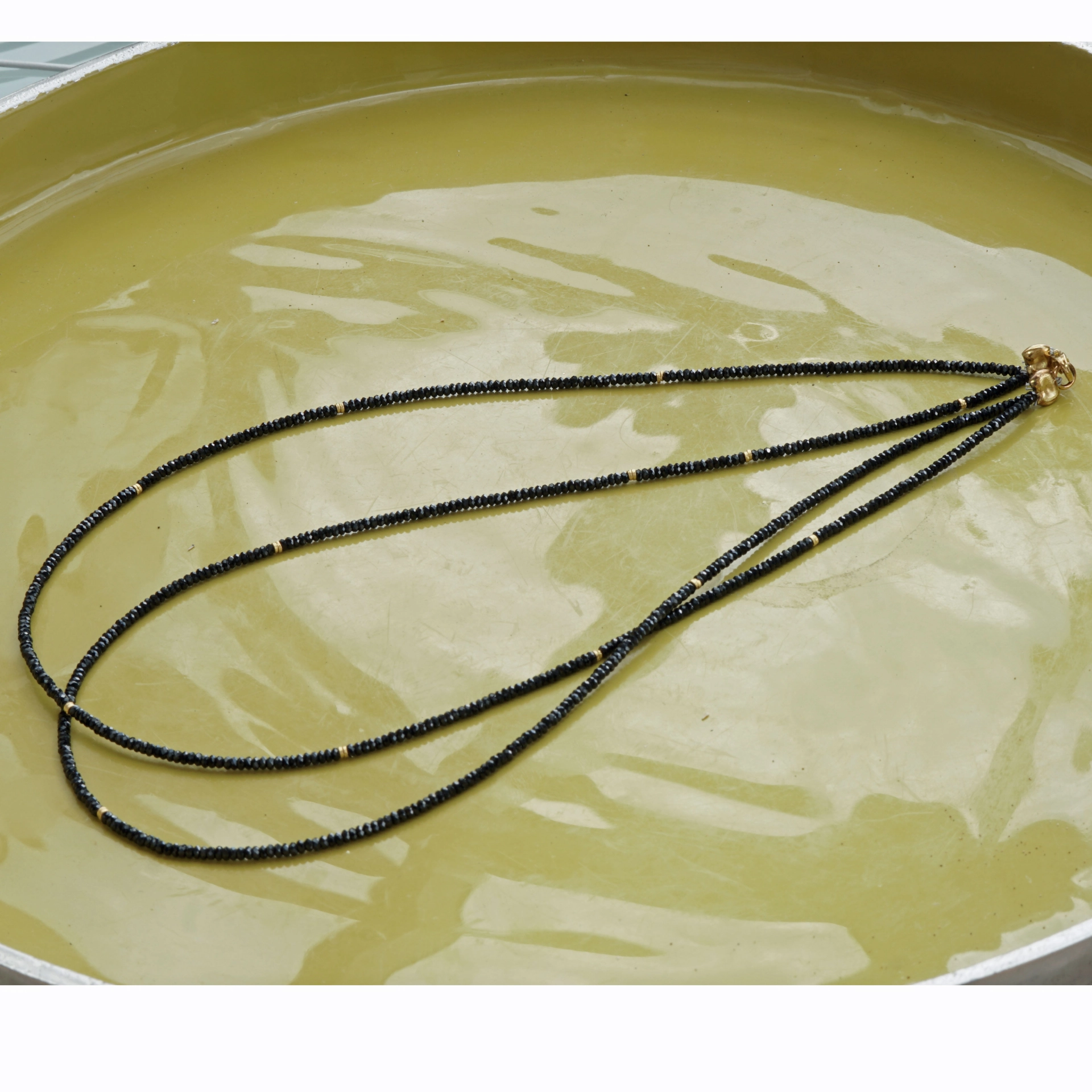 Necklace with the magical black of the black spinel,