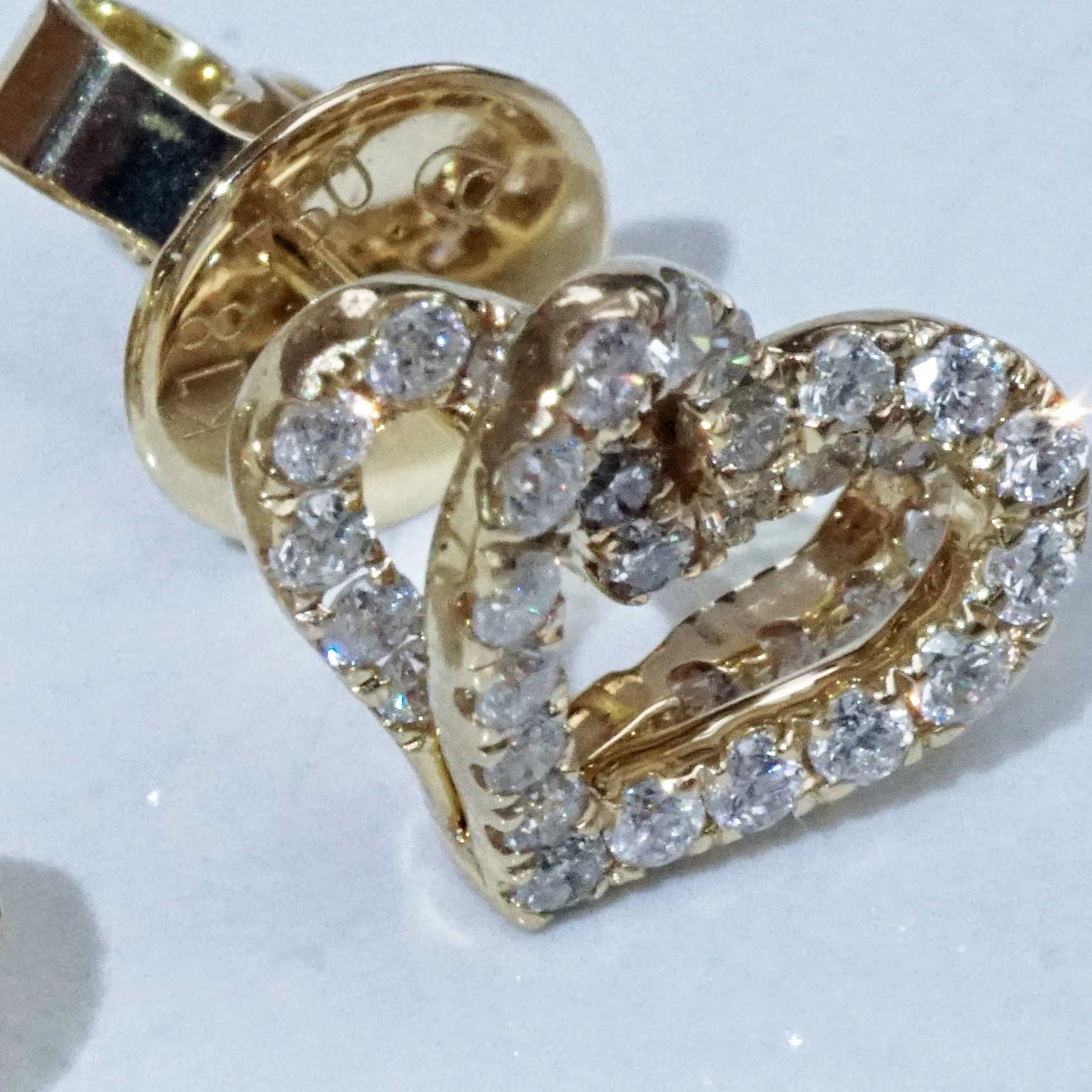 Double Heartbeat for the Ears....Brilliant Earring Studs total 0.56 ct 18 kt Yellow Gold