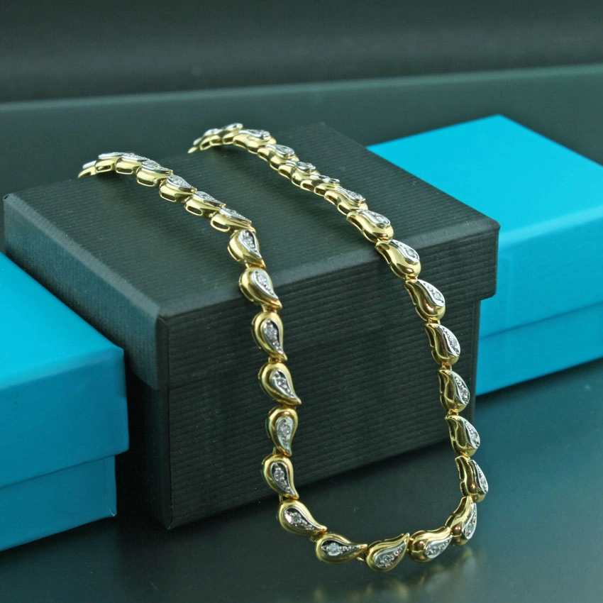 Tropfenspiel-Collier mit Brillanten, 750er-Gelbgold/Platin-1 ct