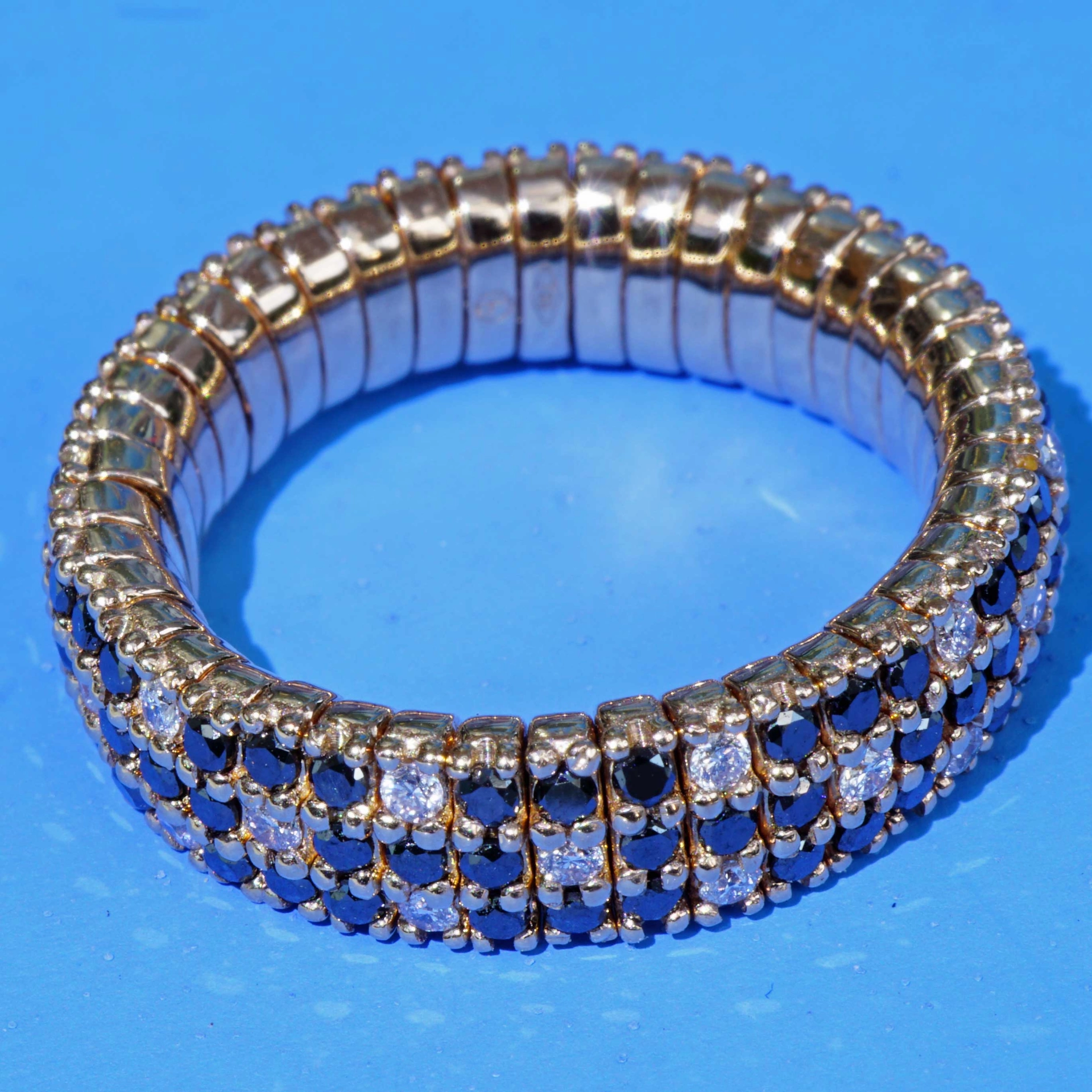 Brilliant Memory Ring Magic flexibel black-white 18 kt Rosegold..ingenious and simple