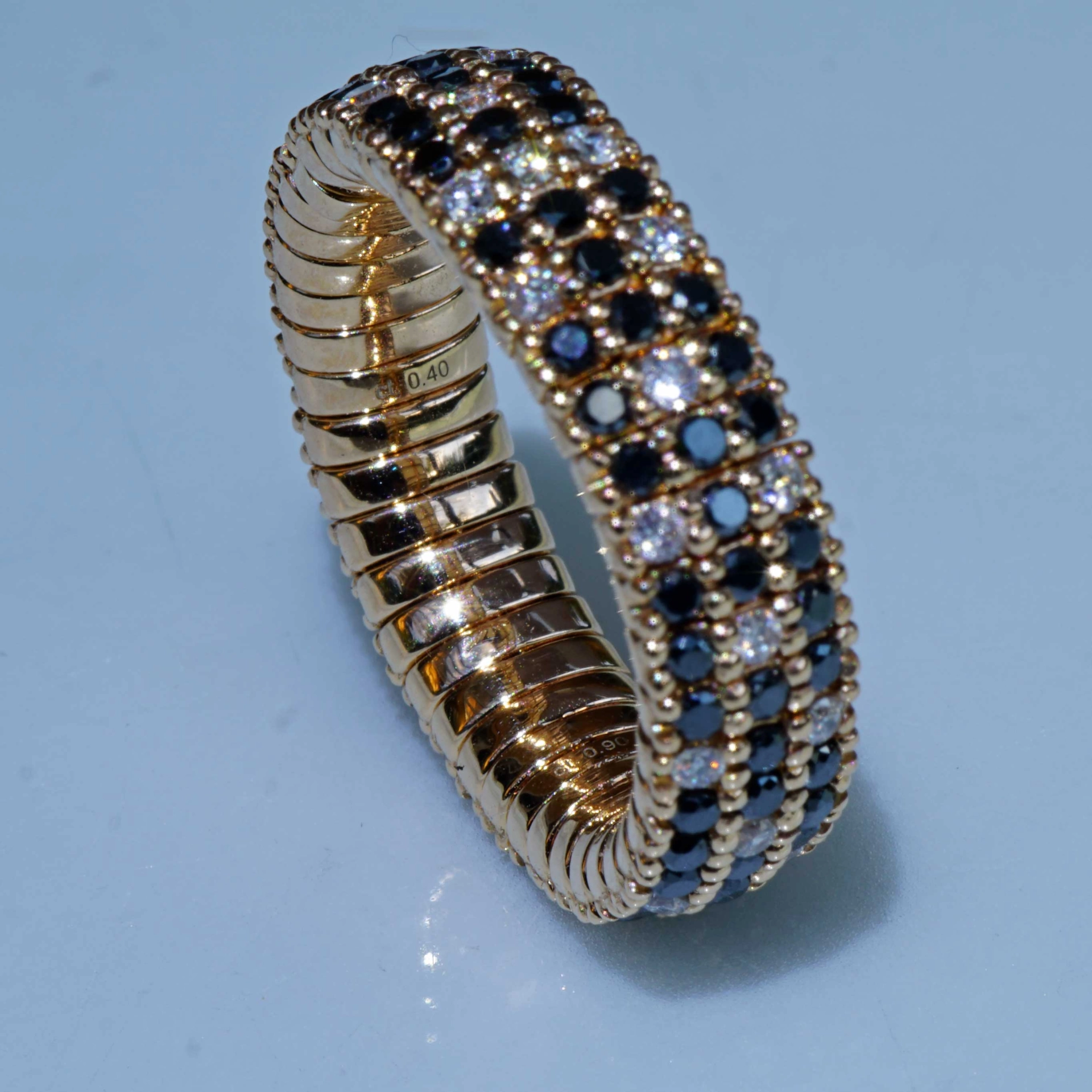Brilliant Memory Ring Magic flexibel black-white 18 kt Rosegold..ingenious and simple