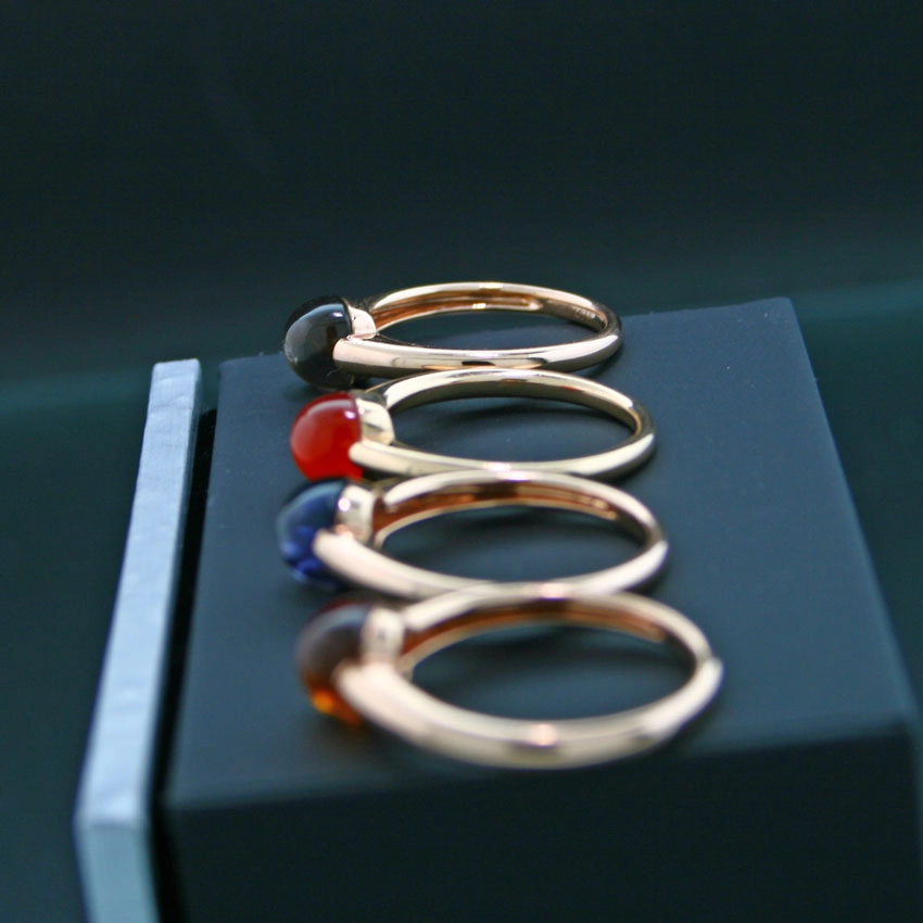 Cushion-Ringe, 750er-Gold mit unterschiedlichen Edelsteinen, 18 kt Rosegold,