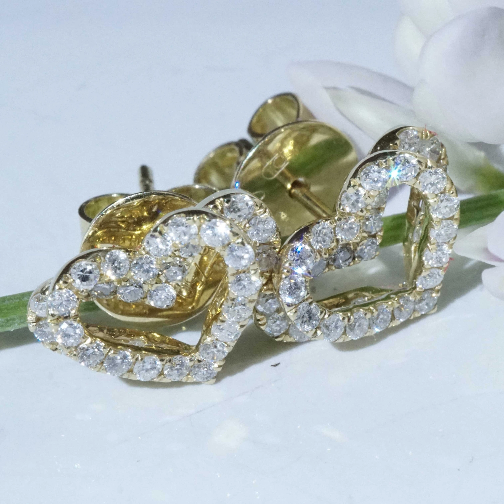 Double Heartbeat for the Ears....Brilliant Earring Studs total 0.56 ct 18 kt Yellow Gold