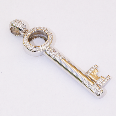 Key Pendant 18 kt solid Whitegold with Brilliants total 1 ct TW IF-VVS....so precious