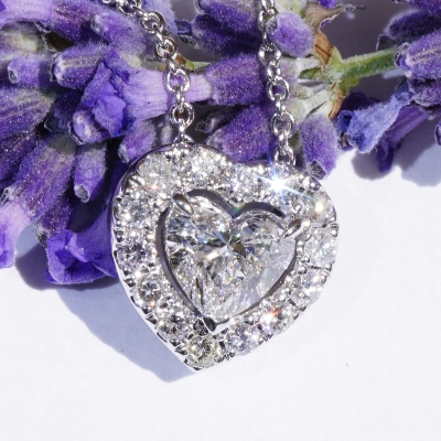 Necklace with Heart full cut brilliant approx. 0.90 ct, H (white) / SI2  GIA report 18 kt White Gold