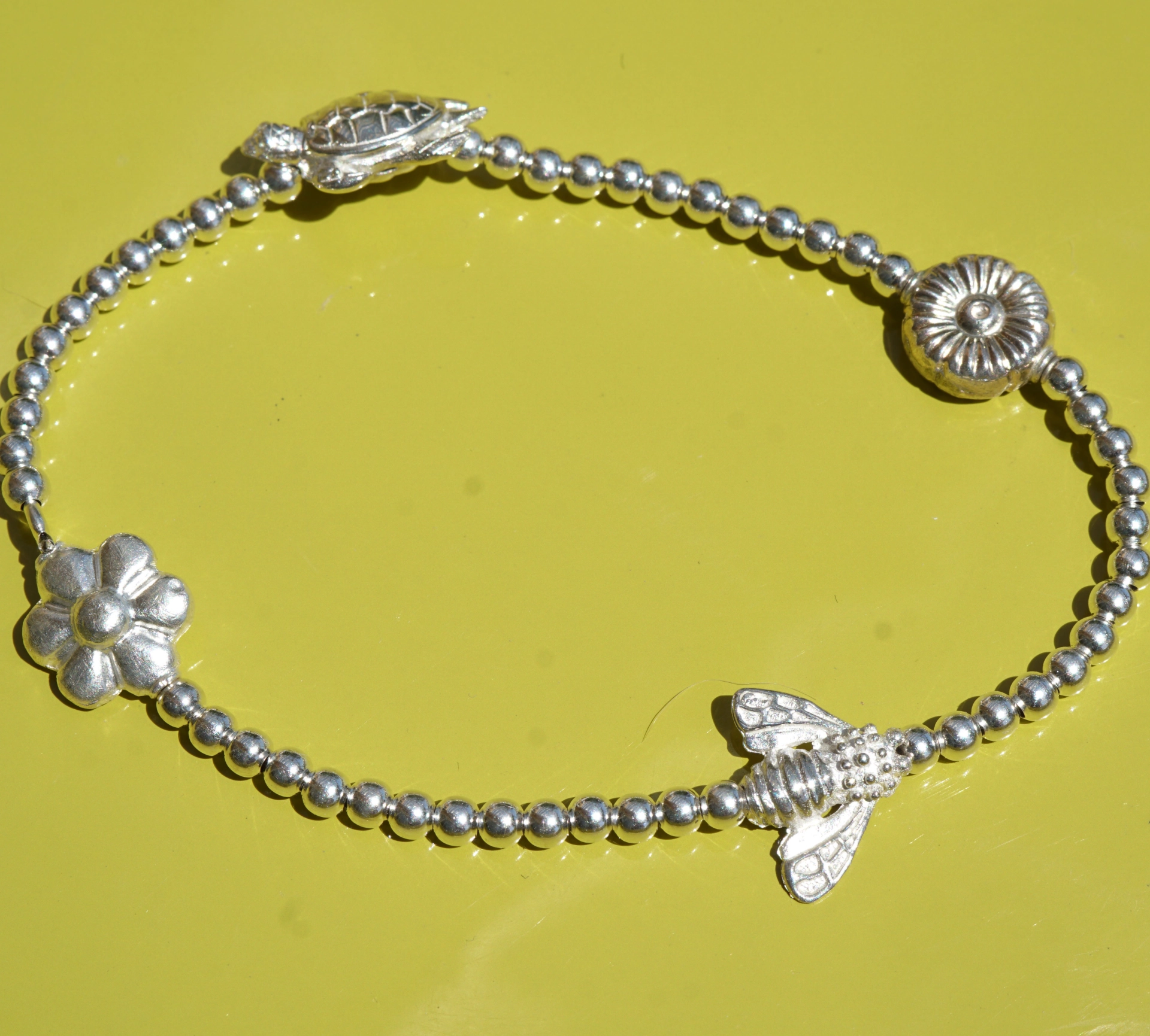 Chilango elastic Bracelet Ball Design Silver cute Motifs (turtle, bee, daisy, heart)