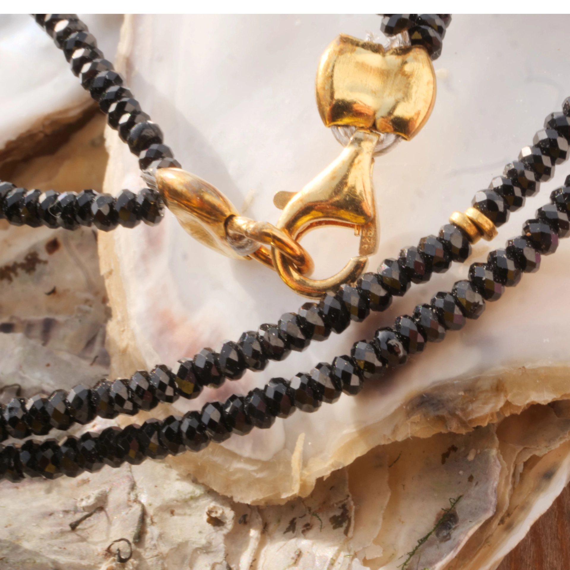 Necklace with the magical black of the black spinel,