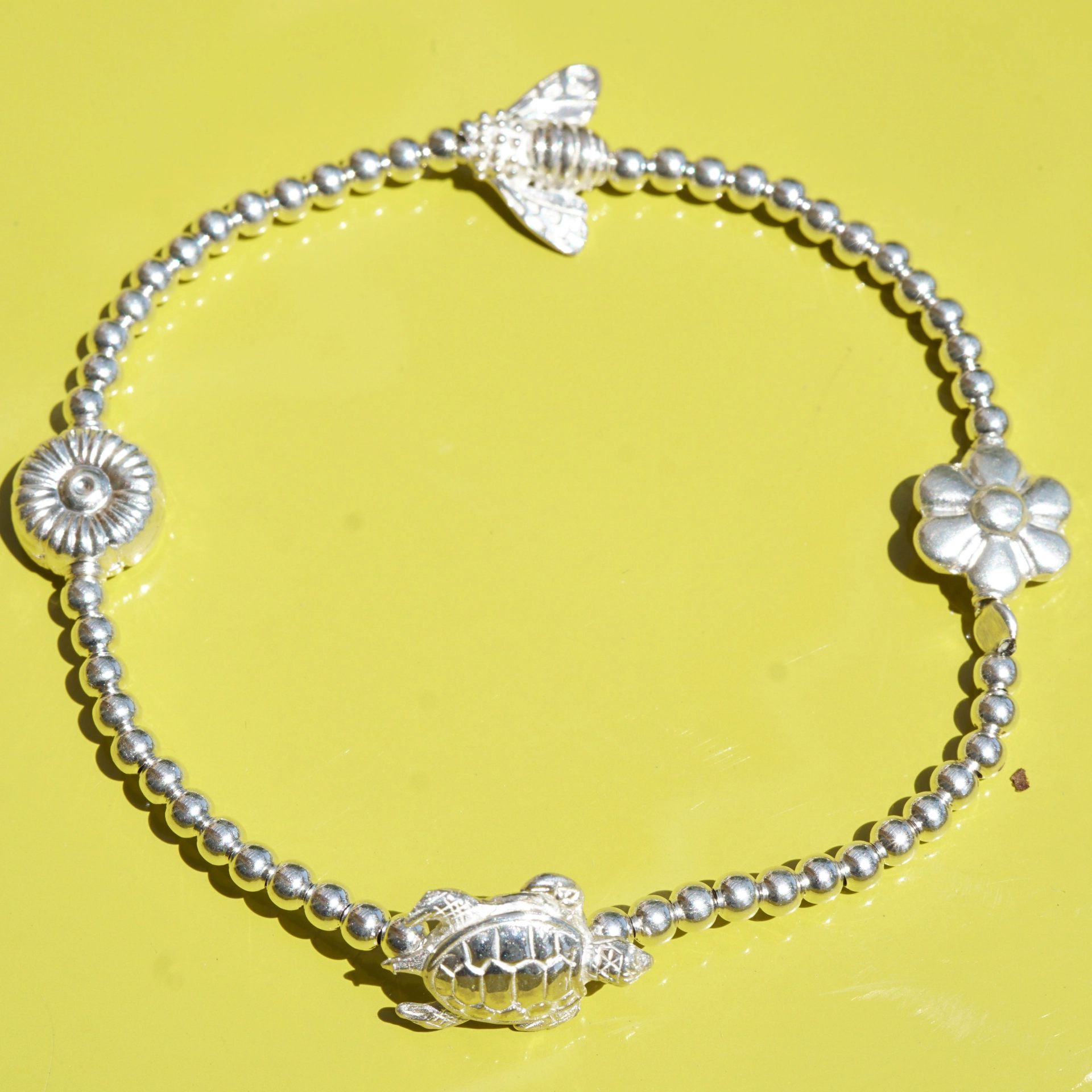 Chilango elastic Bracelet Ball Design Silver cute Motifs (turtle, bee, daisy, heart)