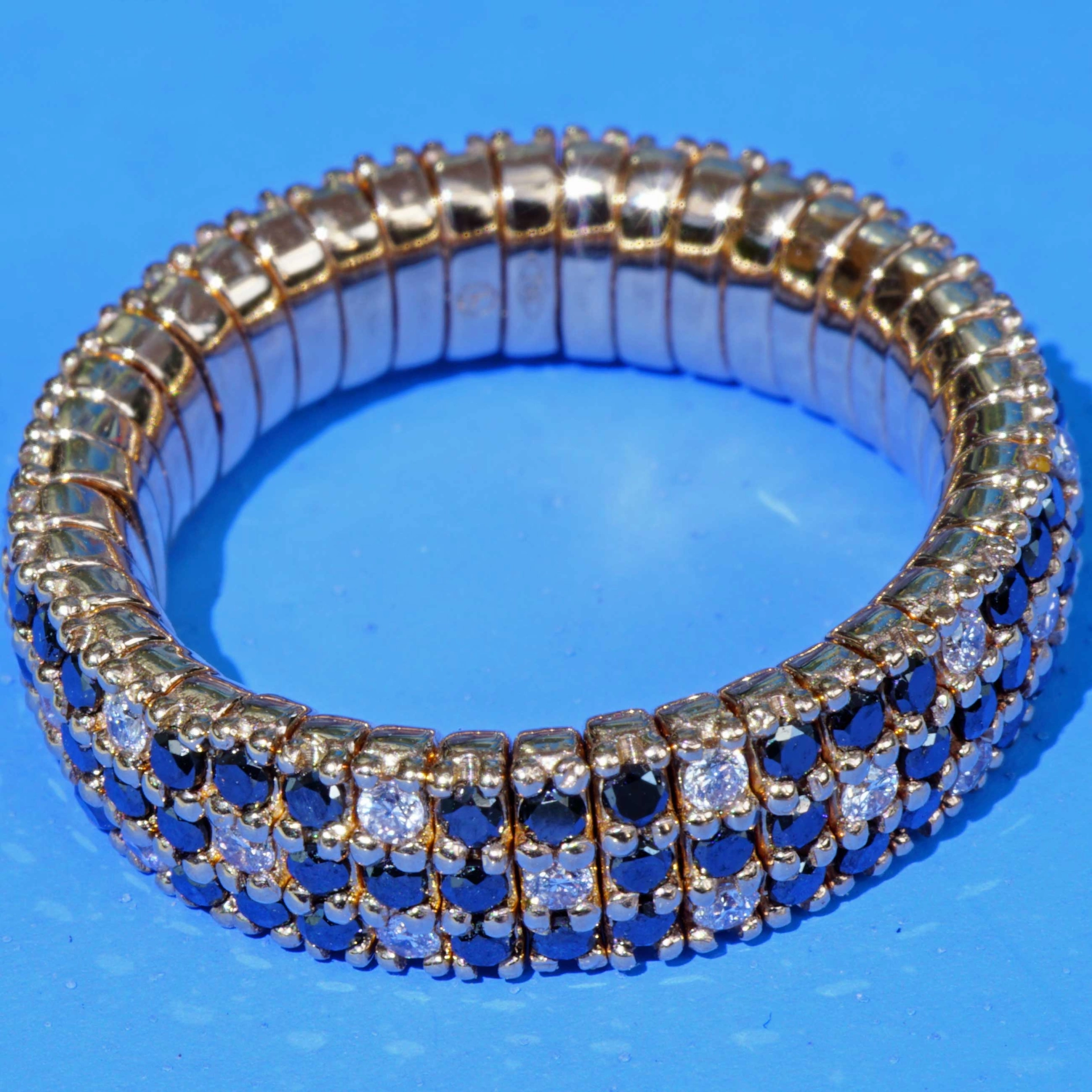 Brilliant Memory Ring Magic flexibel black-white 18 kt Rosegold..ingenious and simple