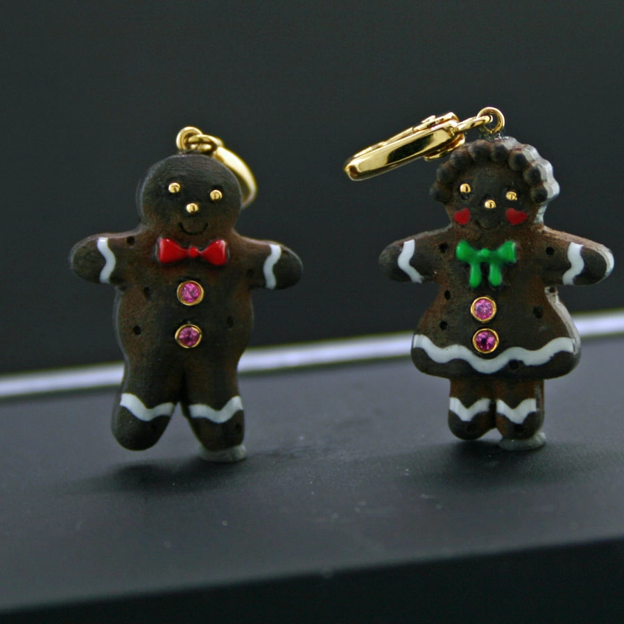 Edelstein-Lebkuchenmann und Lebkuchenfrau, 750-er Gelbgold, 18 kt.,