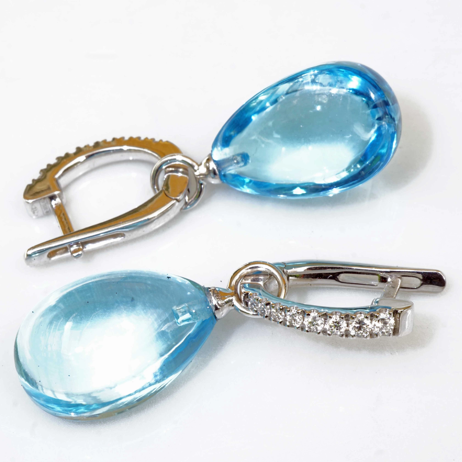Swiss Blue Color Topaz and Brilliants 18 kt White Gold...a miracle Combination