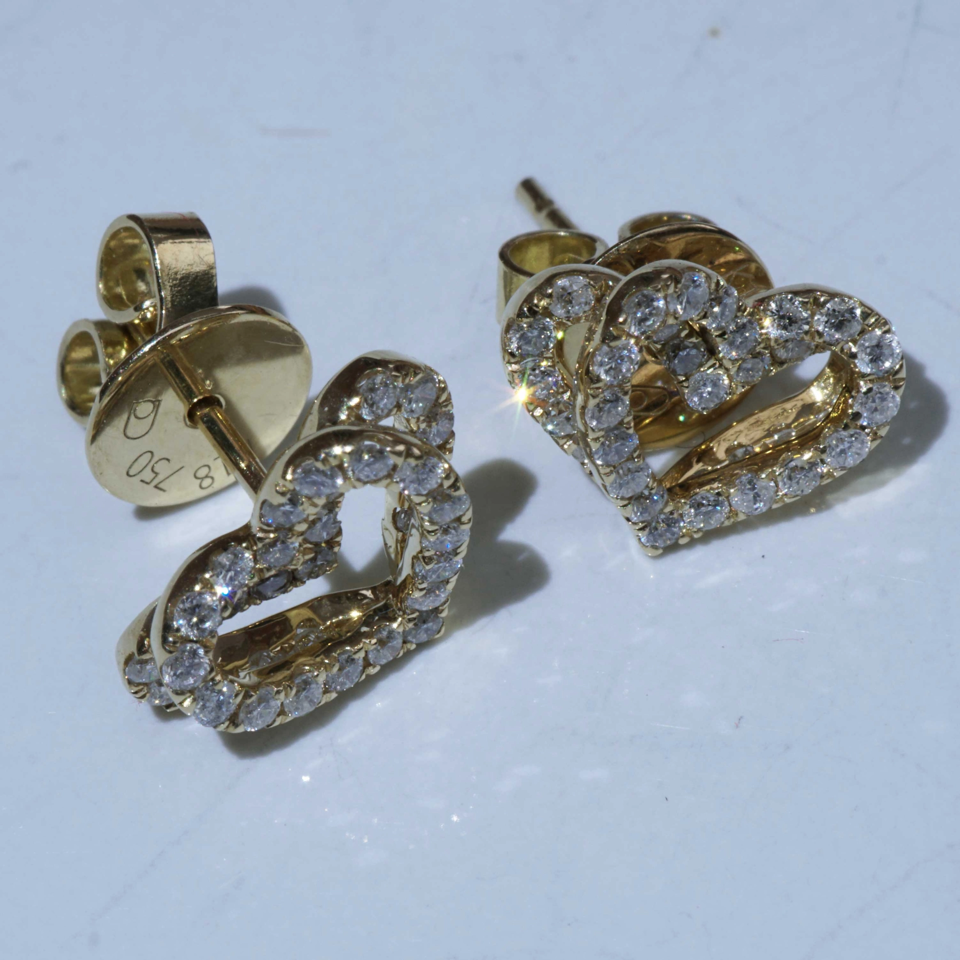 Double Heartbeat for the Ears....Brilliant Earring Studs total 0.56 ct 18 kt Yellow Gold