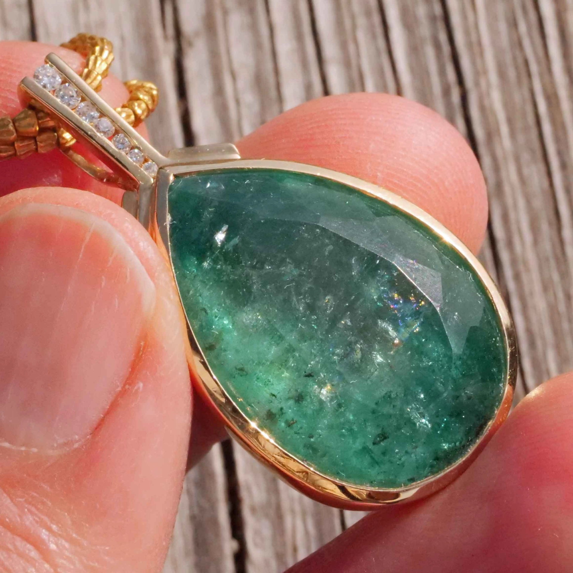 Emerald Drop Brilliant Pendant with magnific 28 carat Weight 14 kt Yellowgold