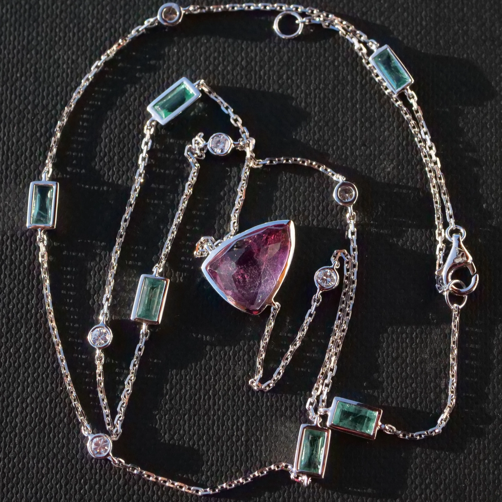 Modern Dream Necklace with kolumbian Emeralds and a Rosecut Turmalin