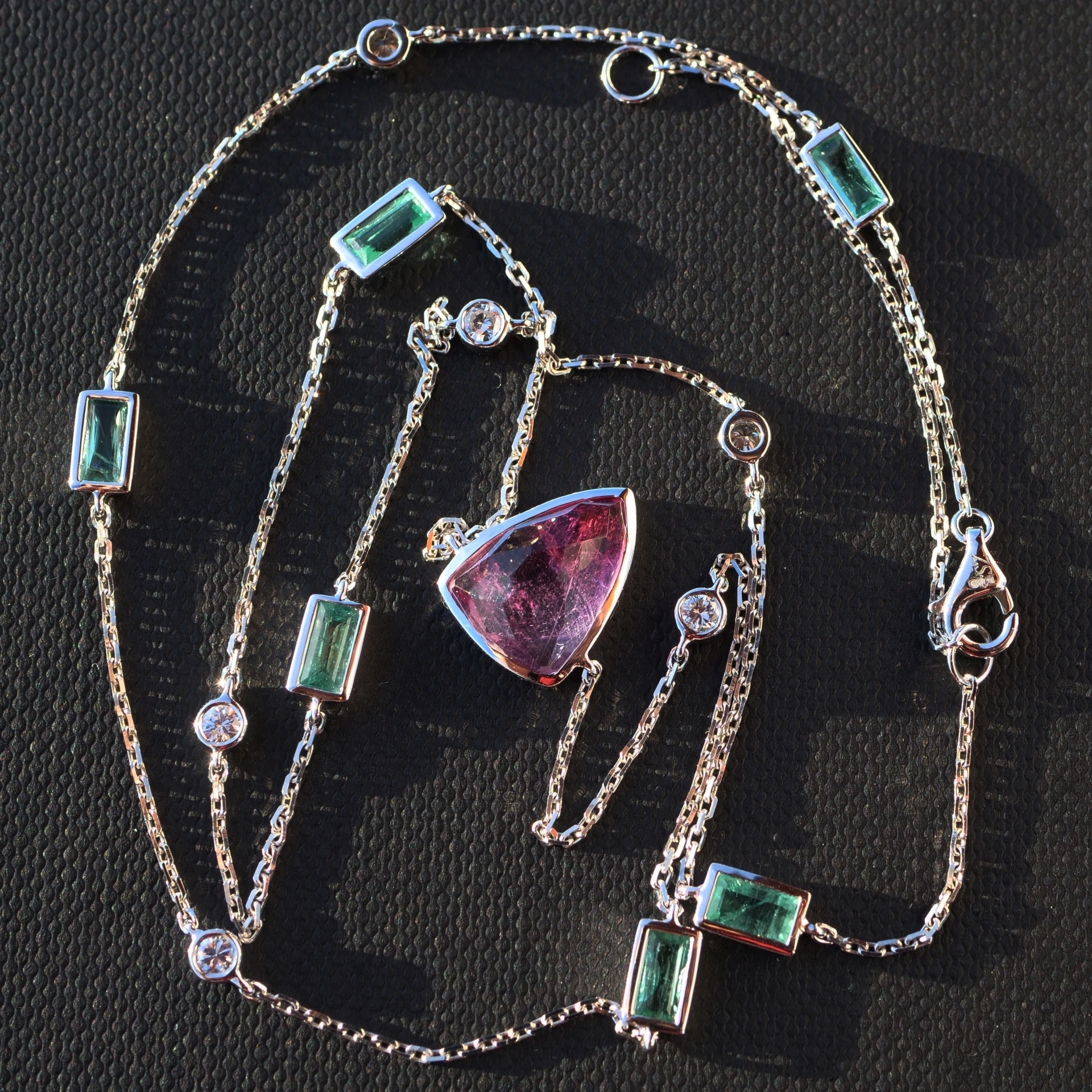 Modern Dream Necklace with kolumbian Emeralds and a Rosecut Turmalin