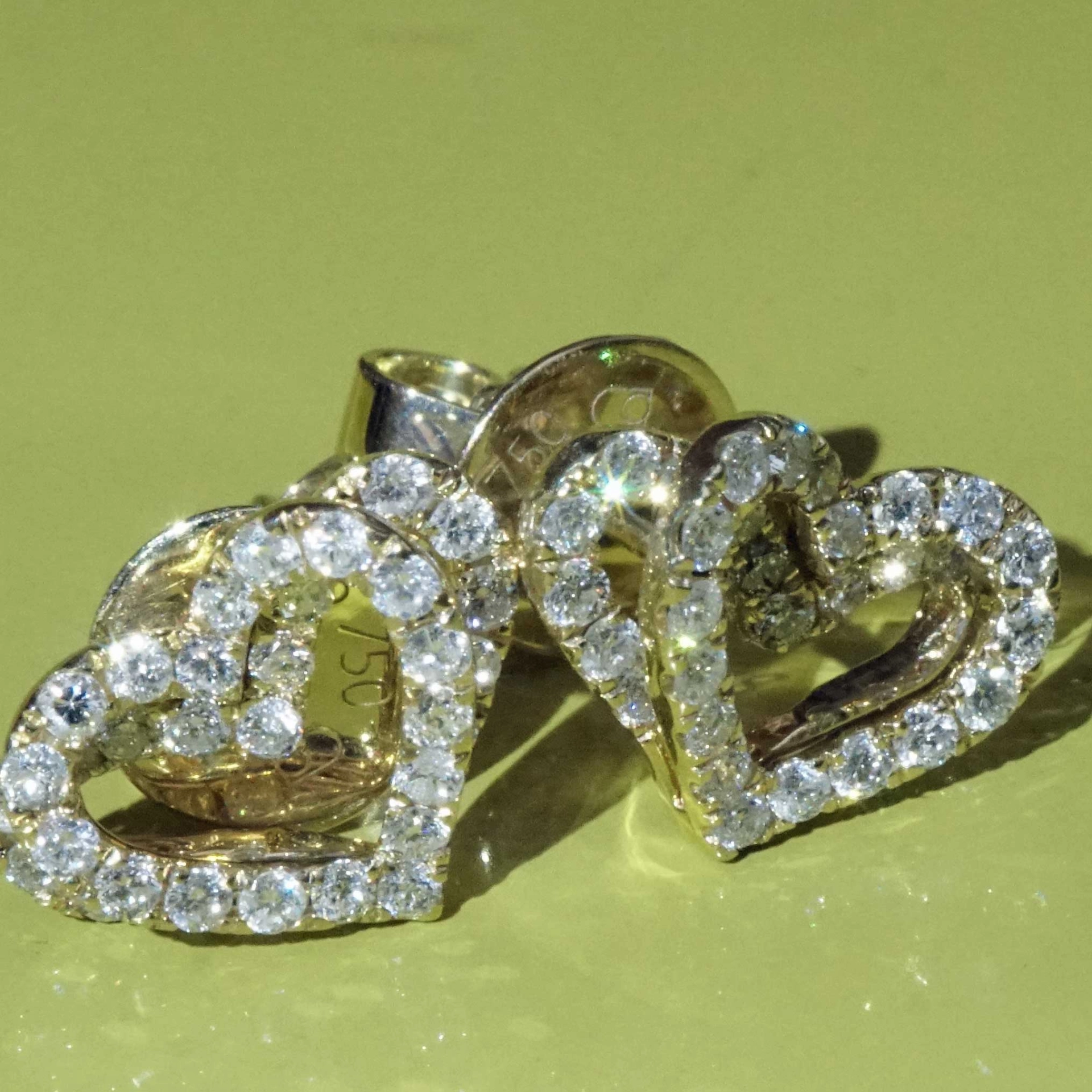 Double Heartbeat for the Ears....Brilliant Earring Studs total 0.56 ct 18 kt Yellow Gold