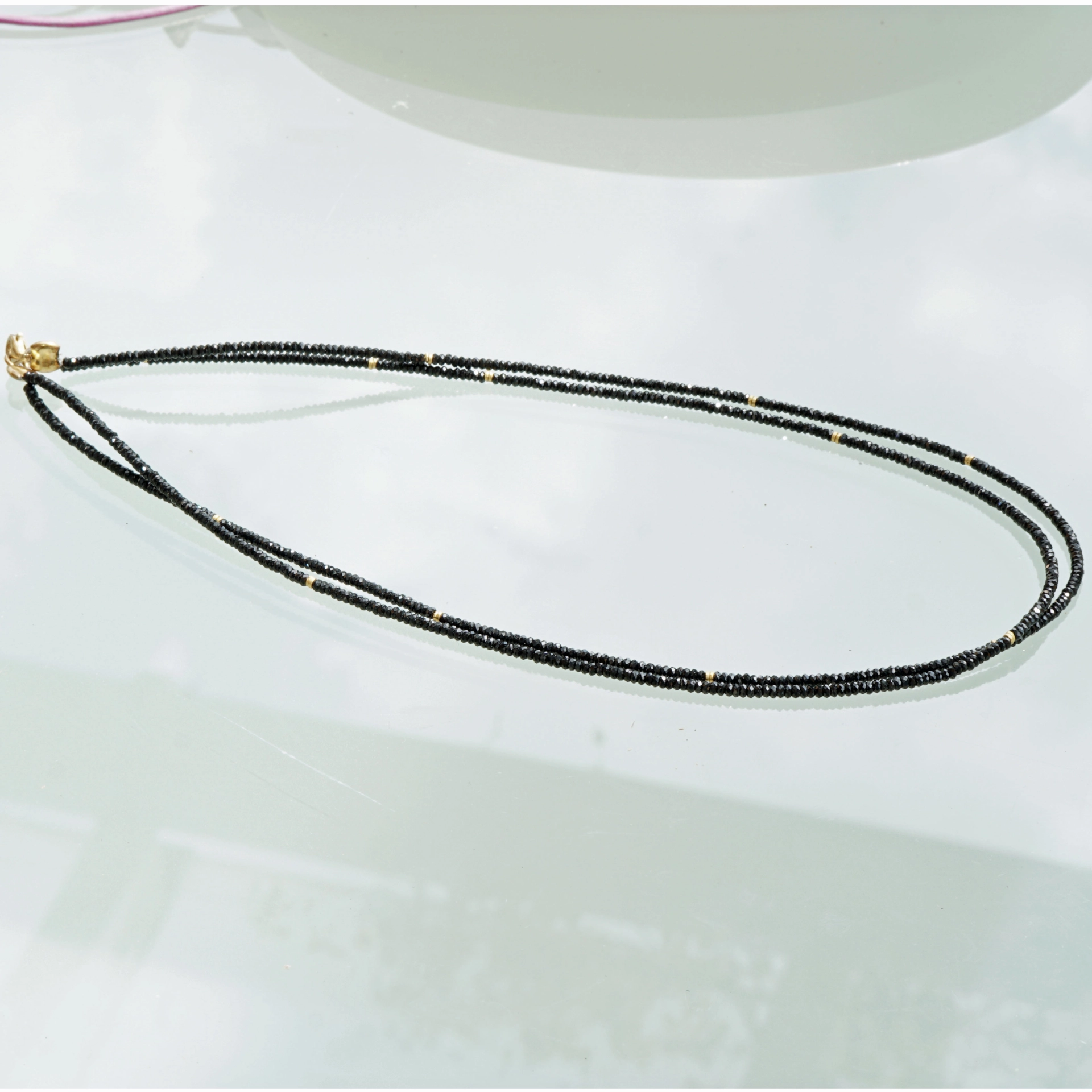 Necklace with the magical black of the black spinel,