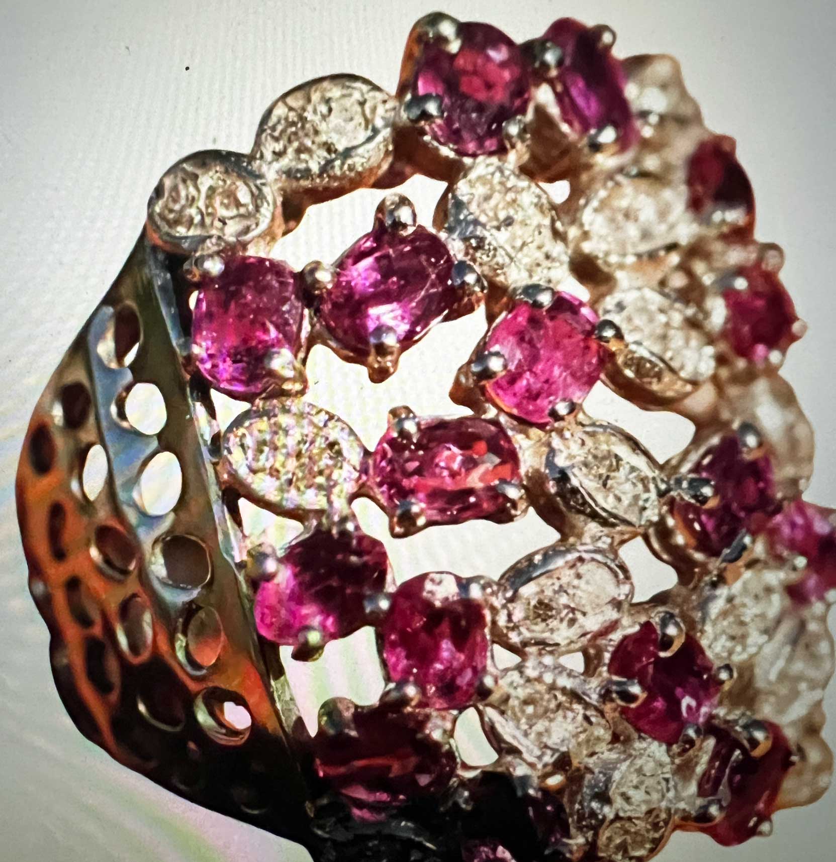 Ruby Brilliant Ring with invisible Cutting 0.70 ct 0.20 ct....looks like one big Ruby