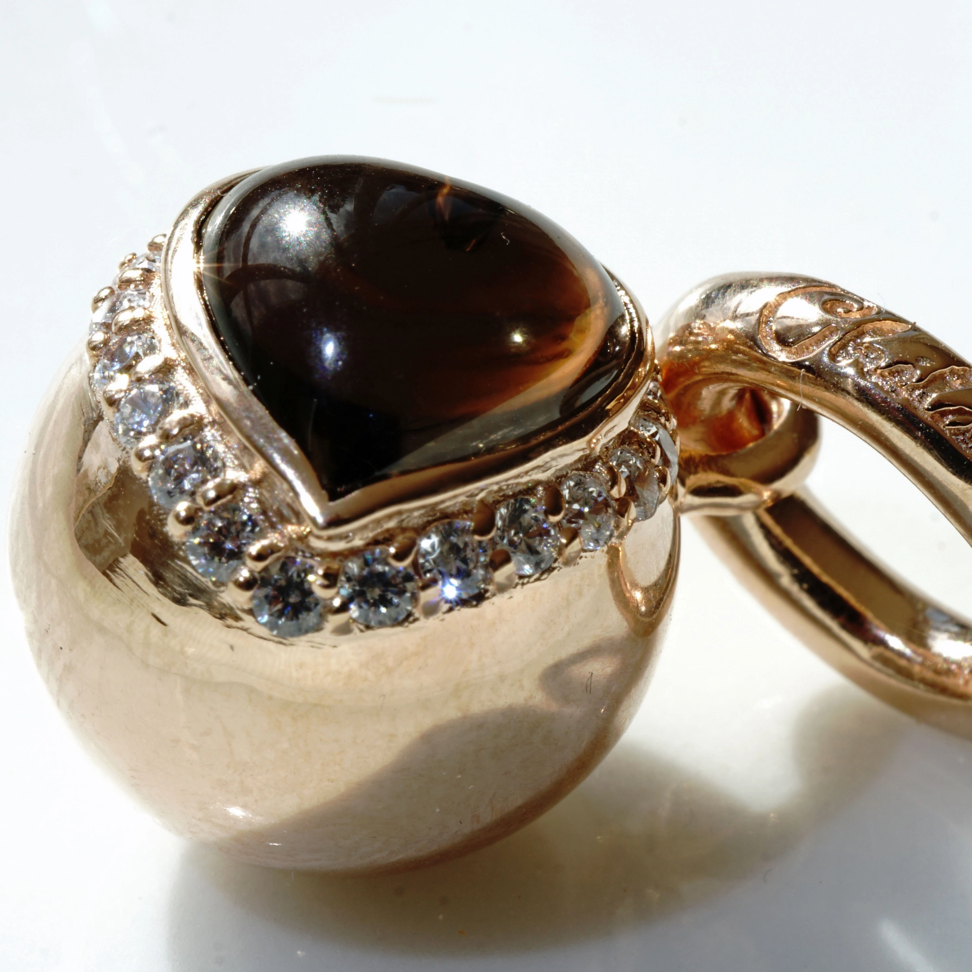 The best Silver Jewelery forever....Heartball with Smokey Quartz
