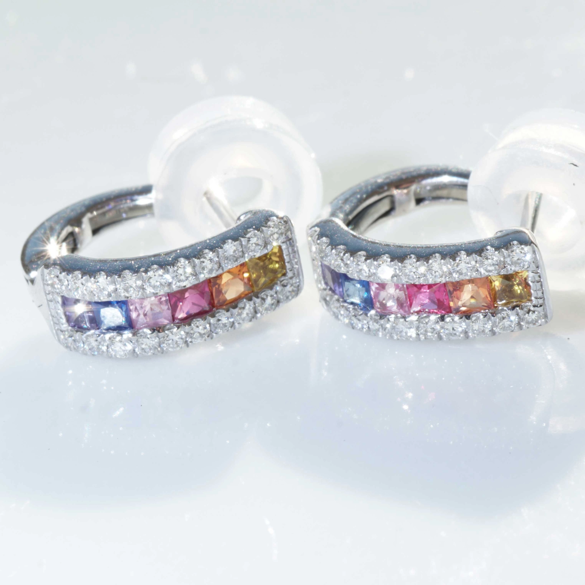 Half Creoles with Bar of colored Saphires, Rubies, Amethyst and Brilliants 18 kt White Gold