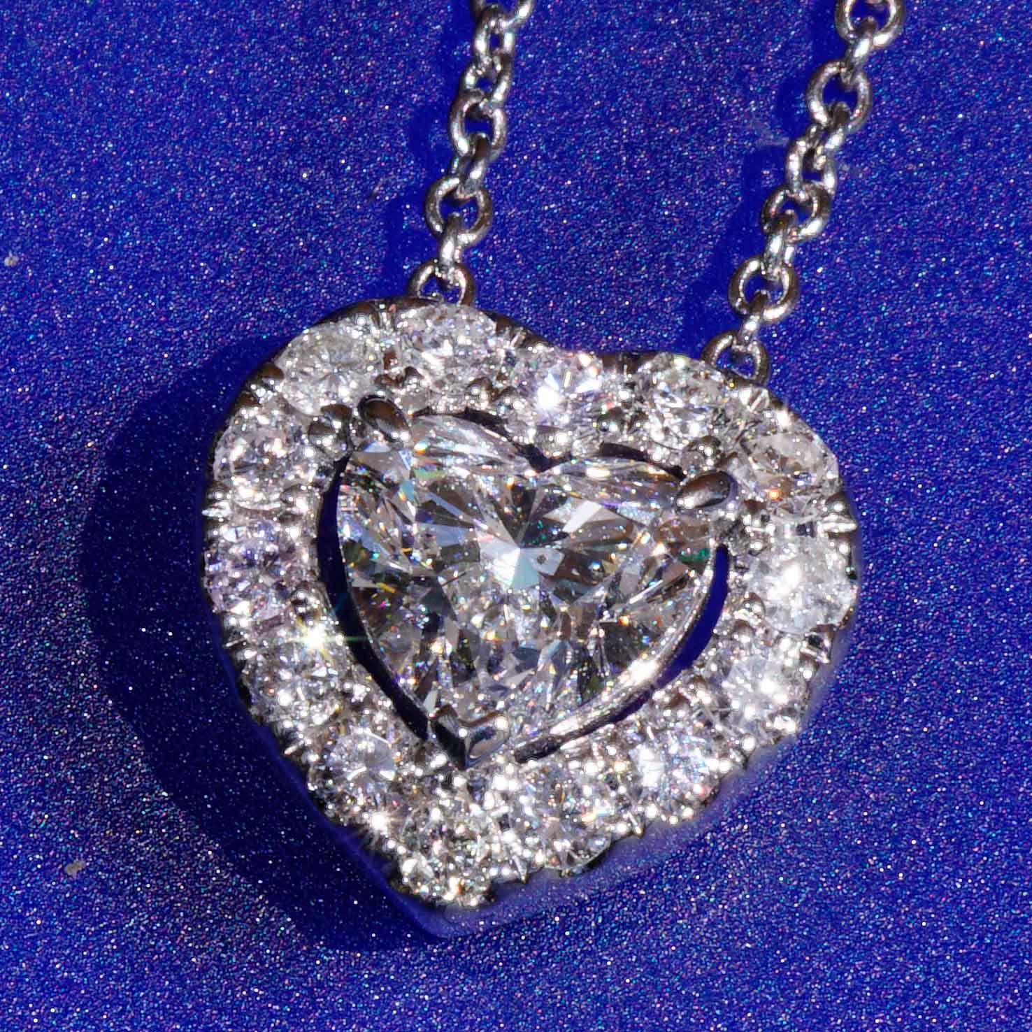 Necklace with Heart full cut brilliant approx. 0.90 ct, H (white) / SI2  GIA report 18 kt White Gold
