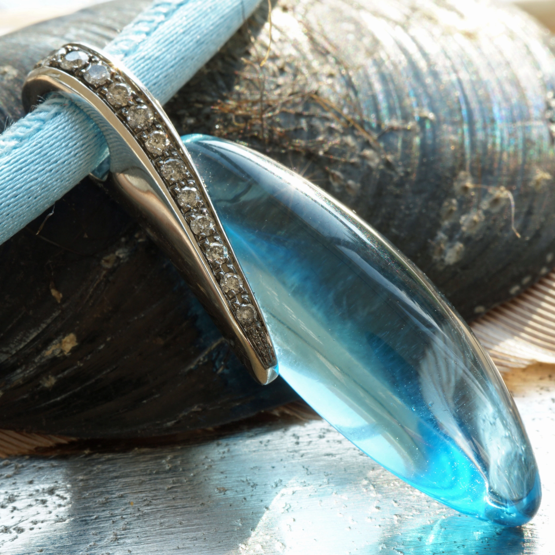 Amazing Color Blue forever a Blue Topas approx. 24 ct modern Setting with Grey Diamonds