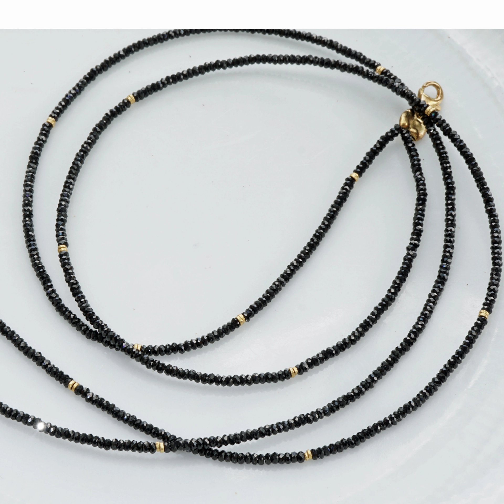 Necklace with the magical black of the black spinel,