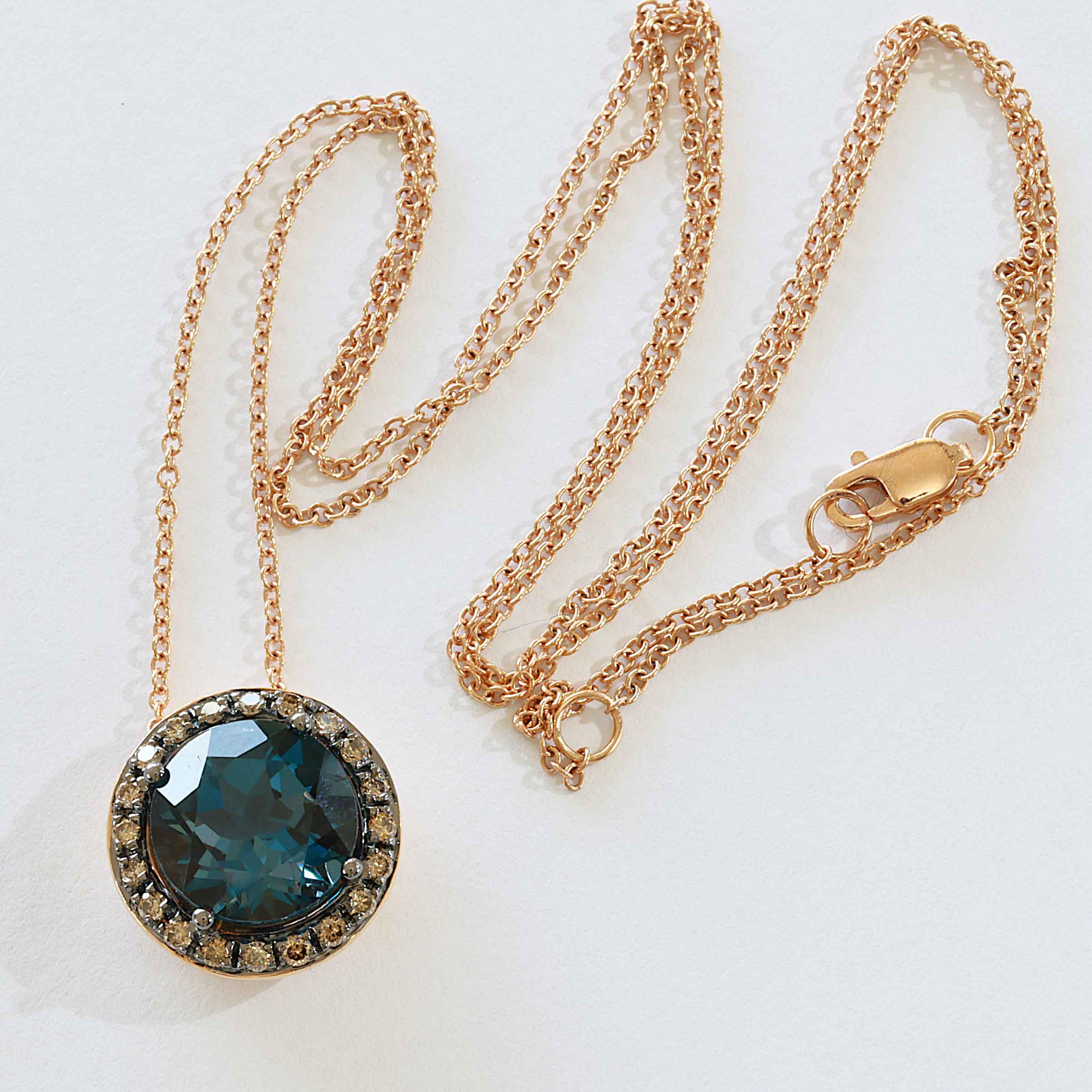 Blue and Grey....what a Cool Combination....Rosegold Pendant 18 kt Topaz and Diamonds