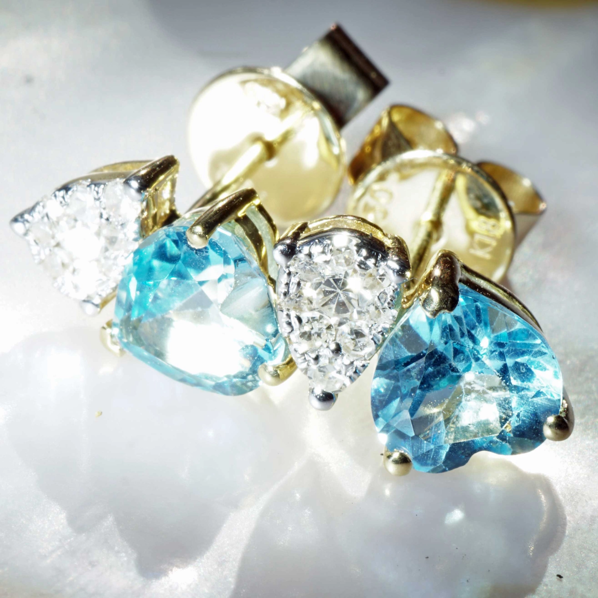 Heart shaped Blue Topaz Earrings 18 kt Yellow Gold with Diamonds