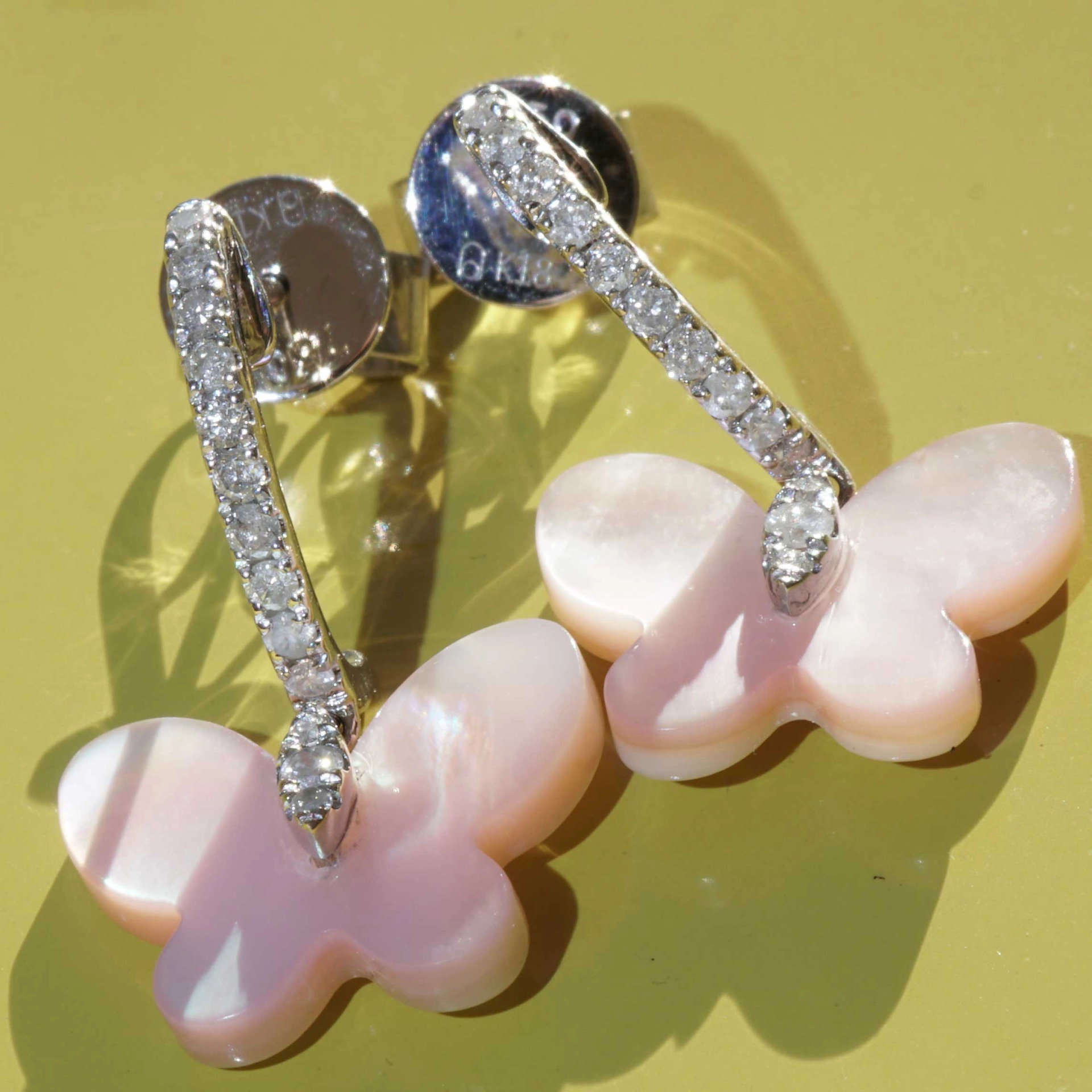 Mother of Pearl Butterfly Brilliant Earrings 18 kt White Gold....fly