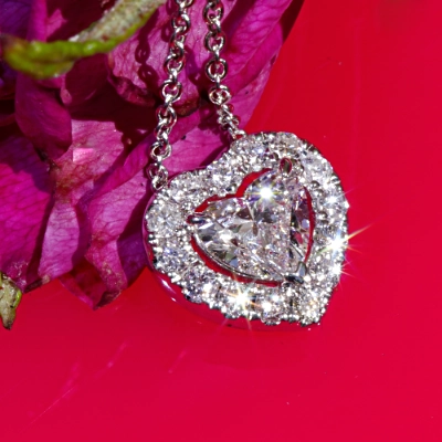 Necklace with Heart full cut brilliant approx. 0.90 ct, H (white) / SI2  GIA report 18 kt White Gold