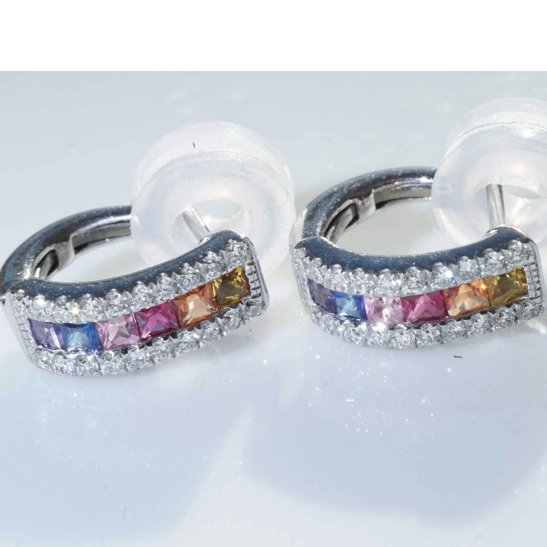 Half Creoles with Bar of colored Saphires, Rubies, Amethyst and Brilliants 18 kt White Gold
