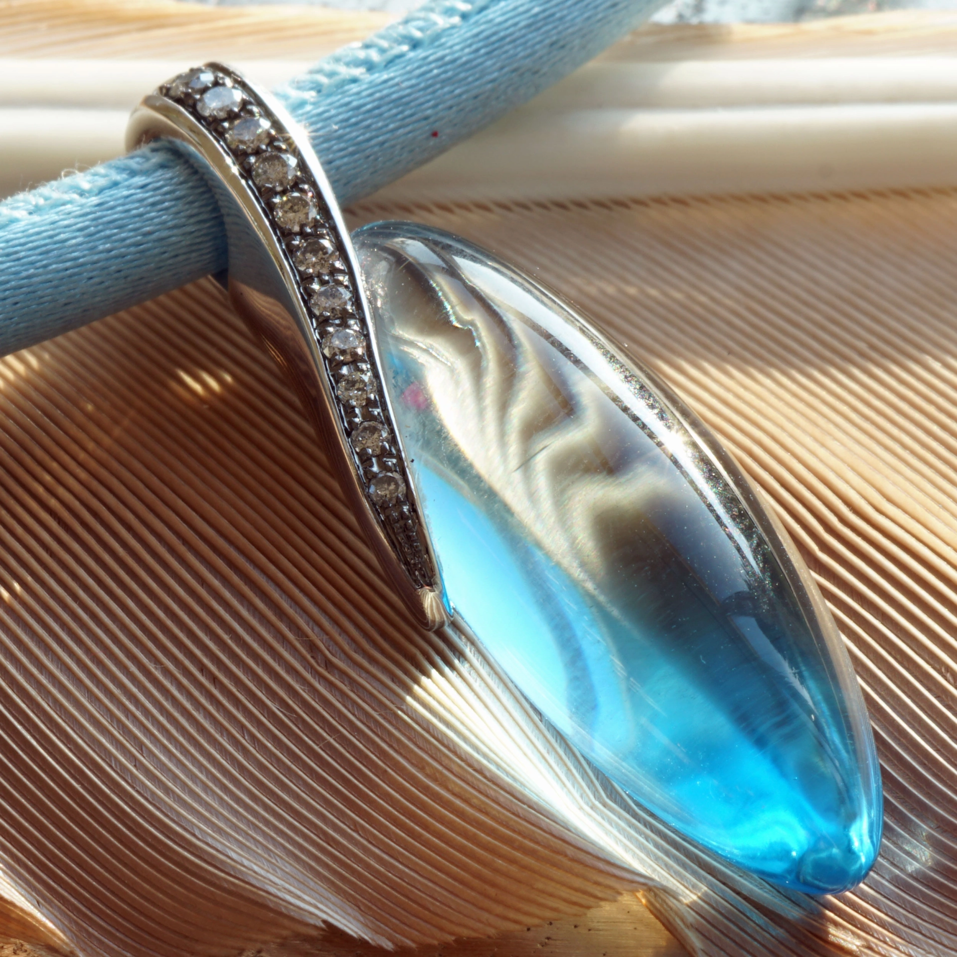 Amazing Color Blue forever a Blue Topas approx. 24 ct modern Setting with Grey Diamonds