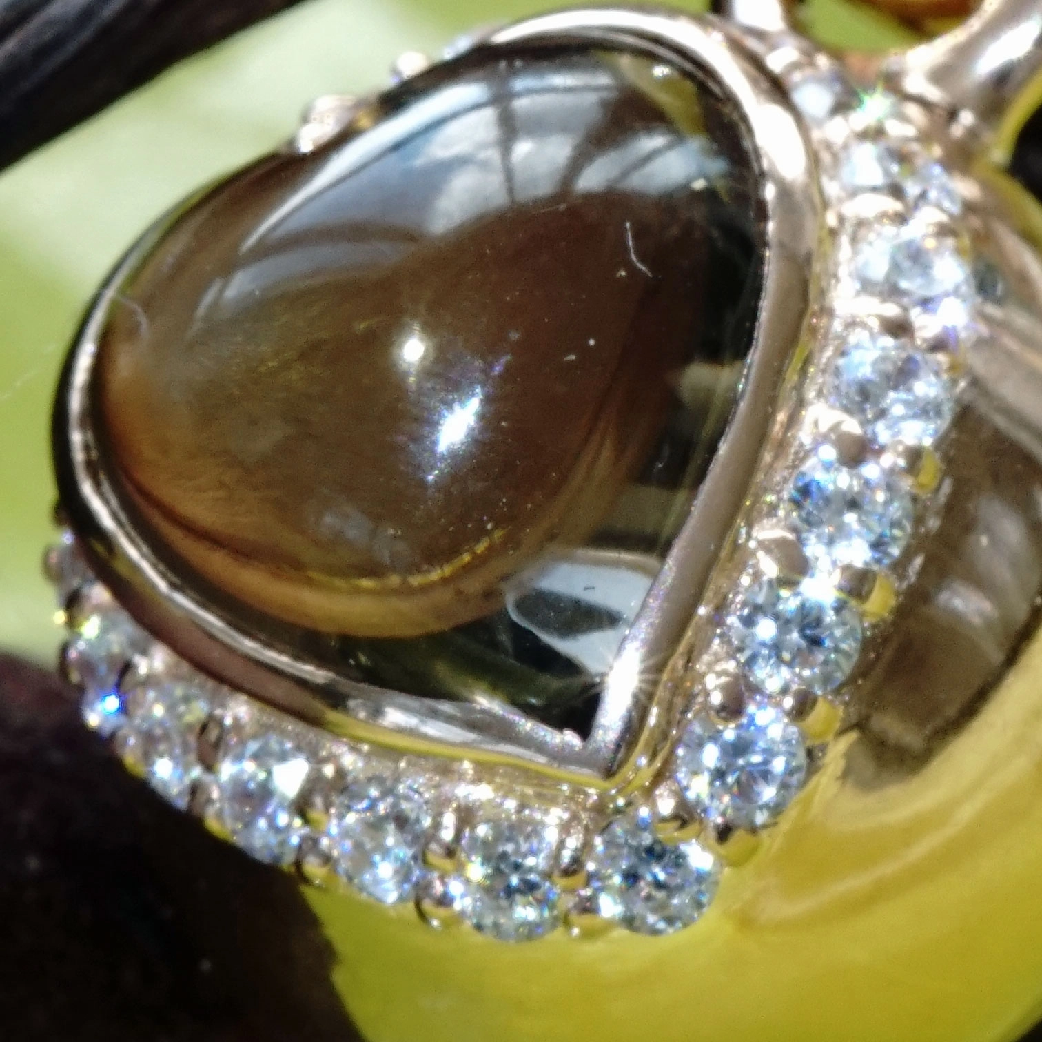 The best Silver Jewelery forever....Heartball with Smokey Quartz
