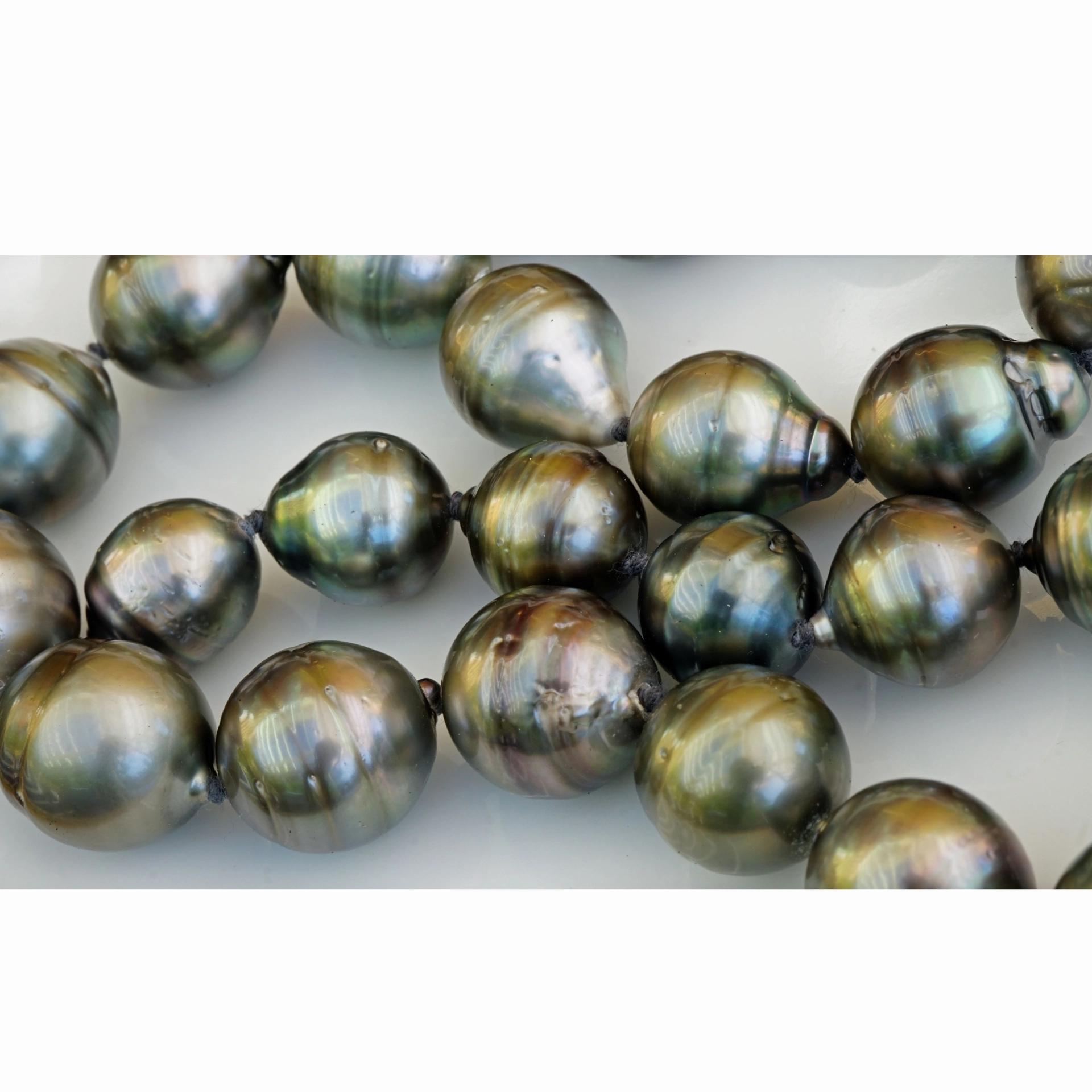 Representative Strand of baroque Tahiti cultured Pearls 12-15 mm