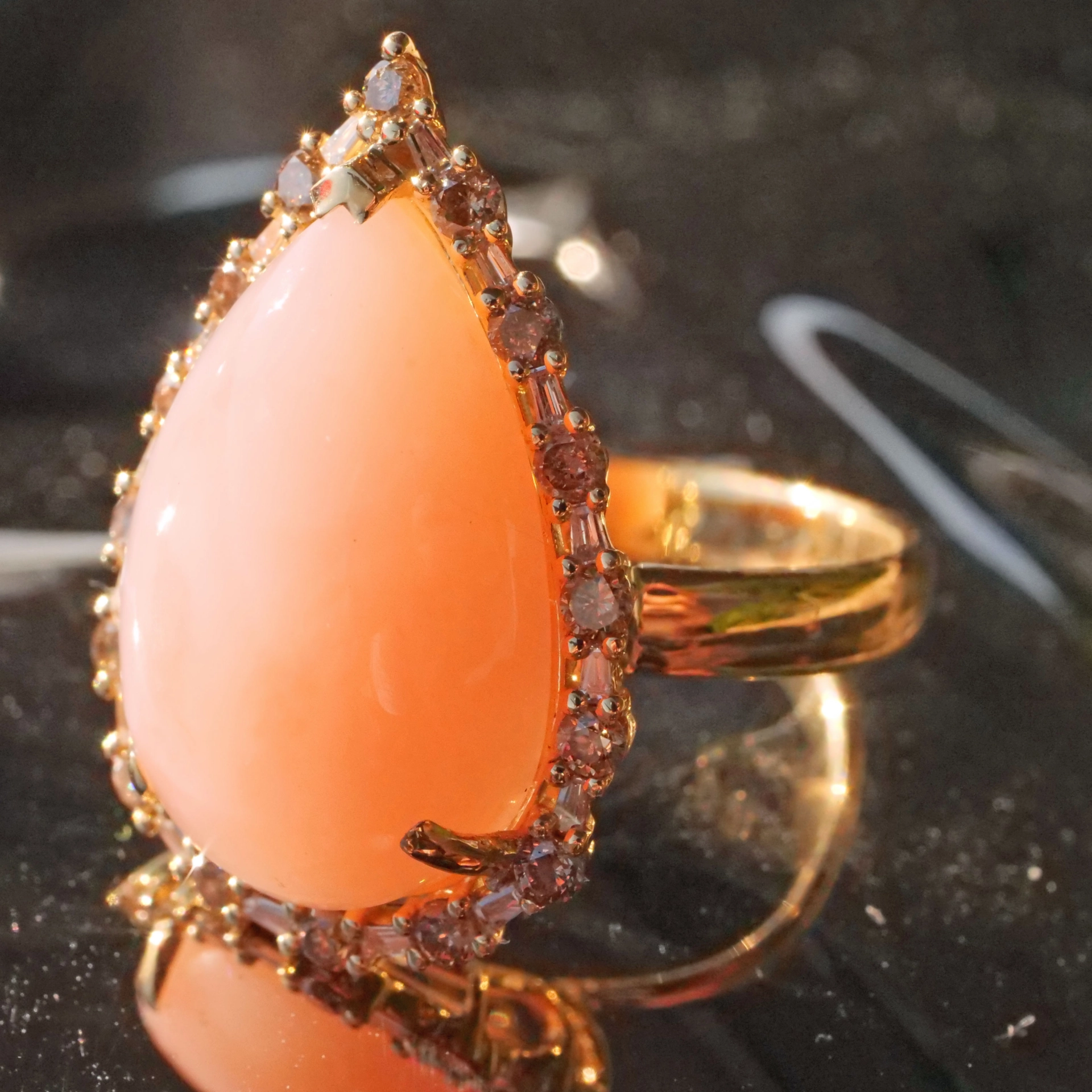 Andean Opal Cabochon effectively wreathed with Diamond Baguettes and Brilliants 18 kt Yellow Gold