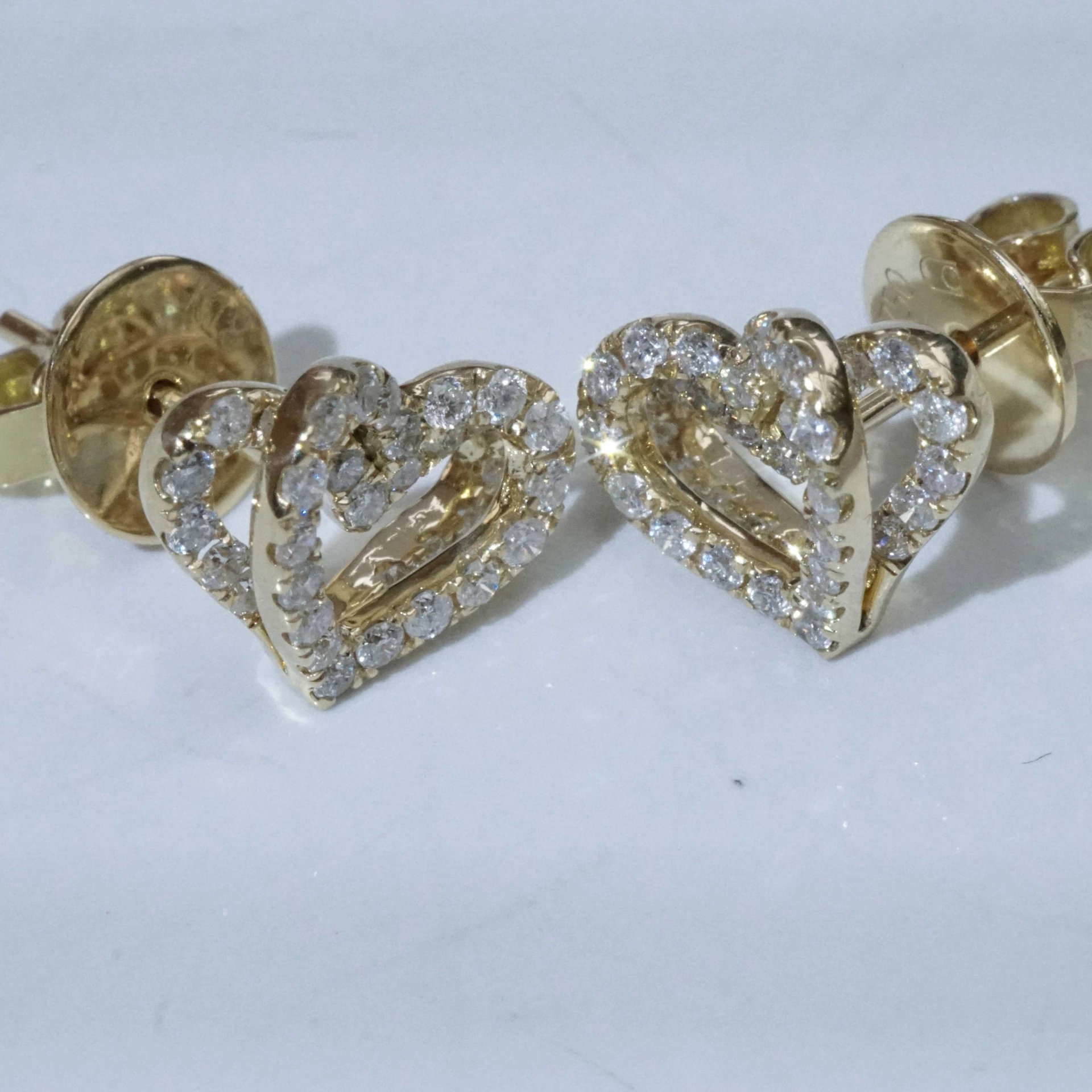Double Heartbeat for the Ears....Brilliant Earring Studs total 0.56 ct 18 kt Yellow Gold